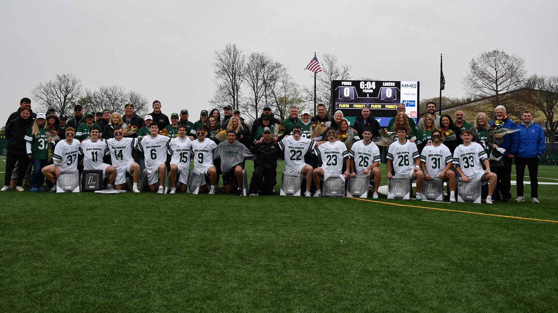 2026 Men's Lacrosse seniors and graduate students with their families on Senior Day