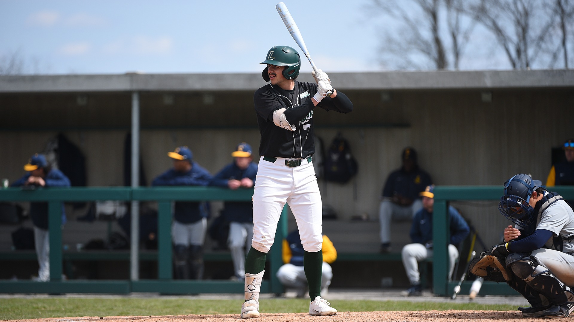 Adam Sullivan stands at the plate against Coppin State