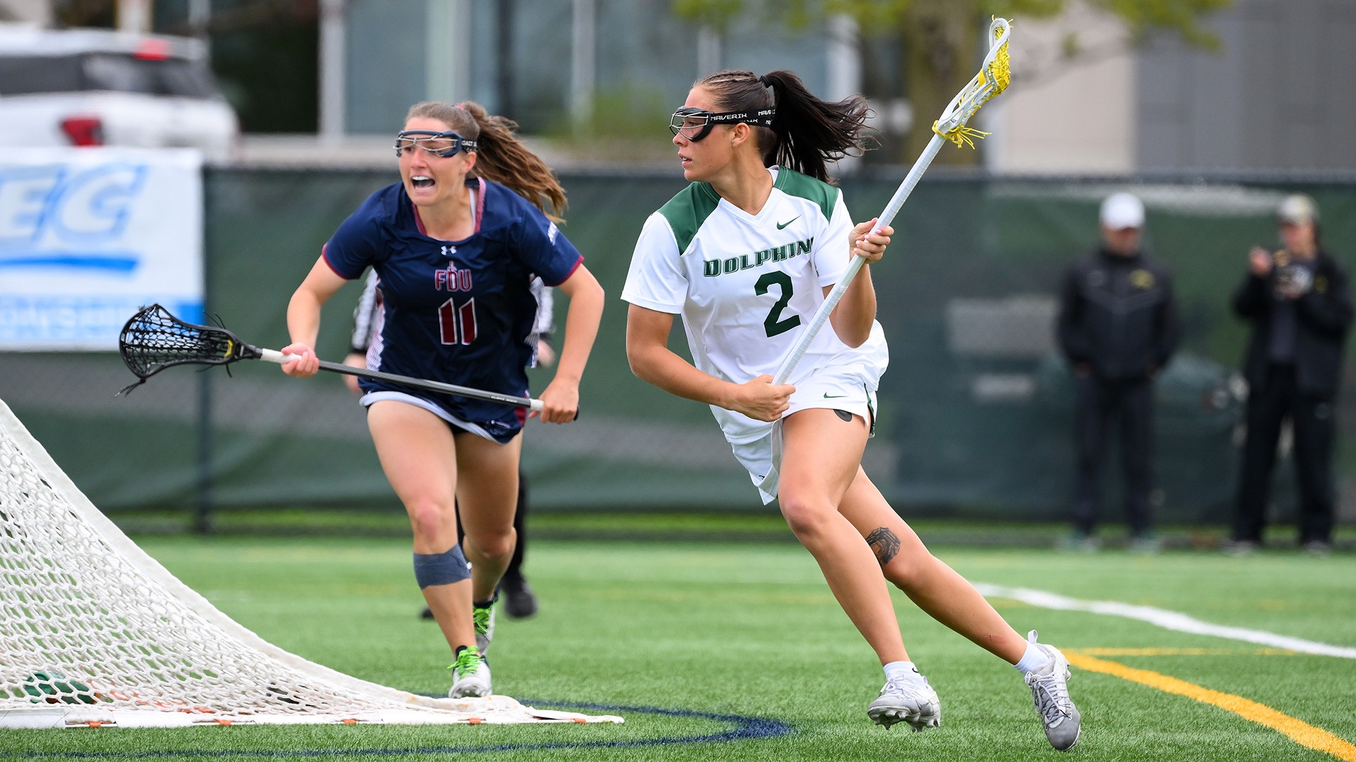 Francesca Tortora carries the ball behind the net against FDU in the NEC Semifinals