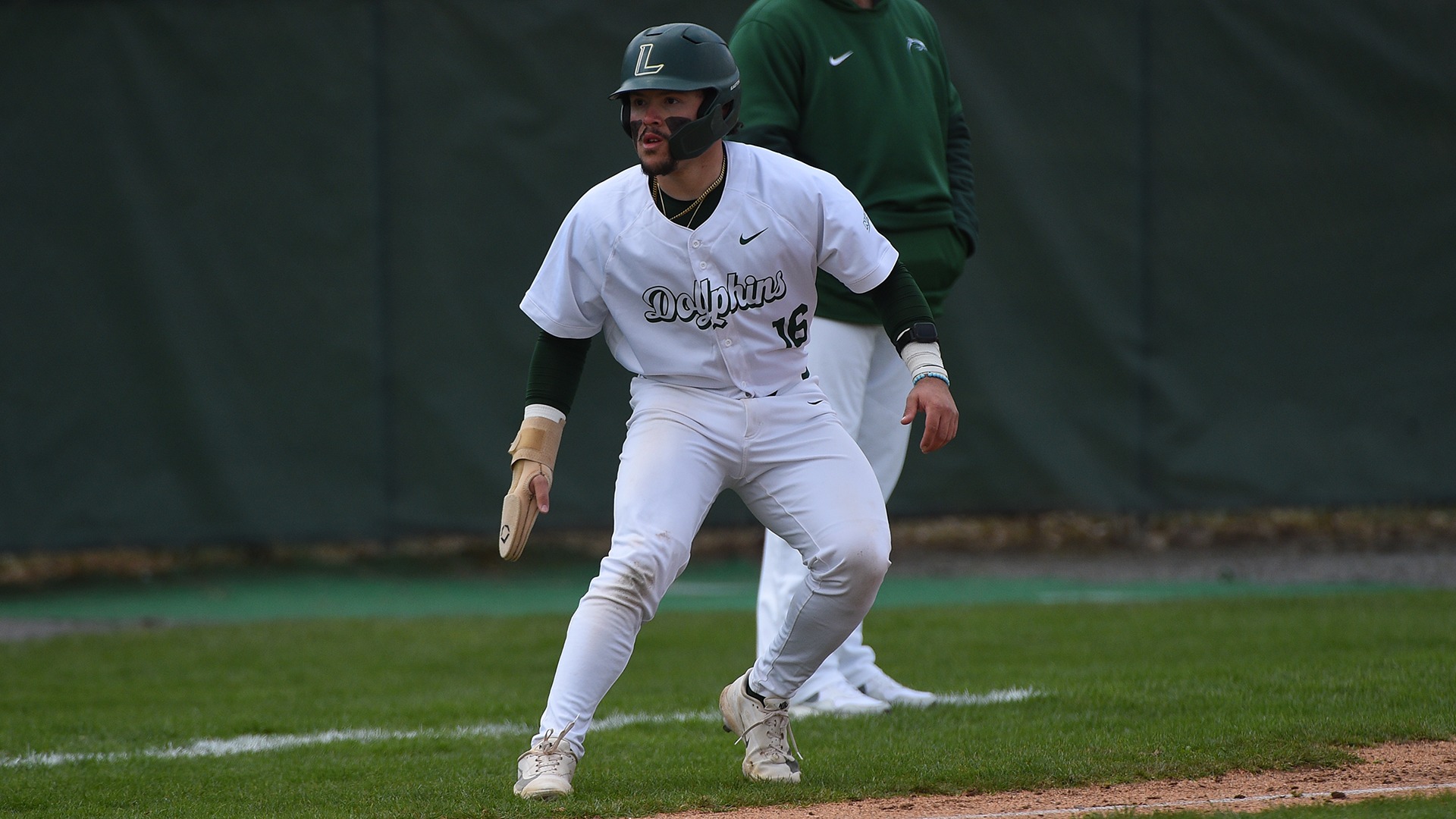 Derek Diaz takes a lead off third base against Mercyhurst on April 11