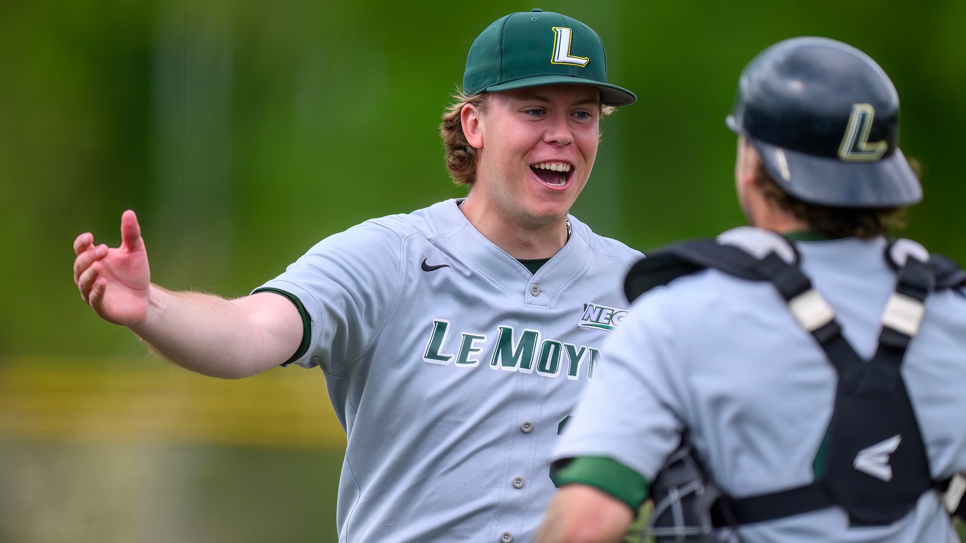 Luke Connors and Cooper Romich go in for a hug after defeating Central Connecticut State