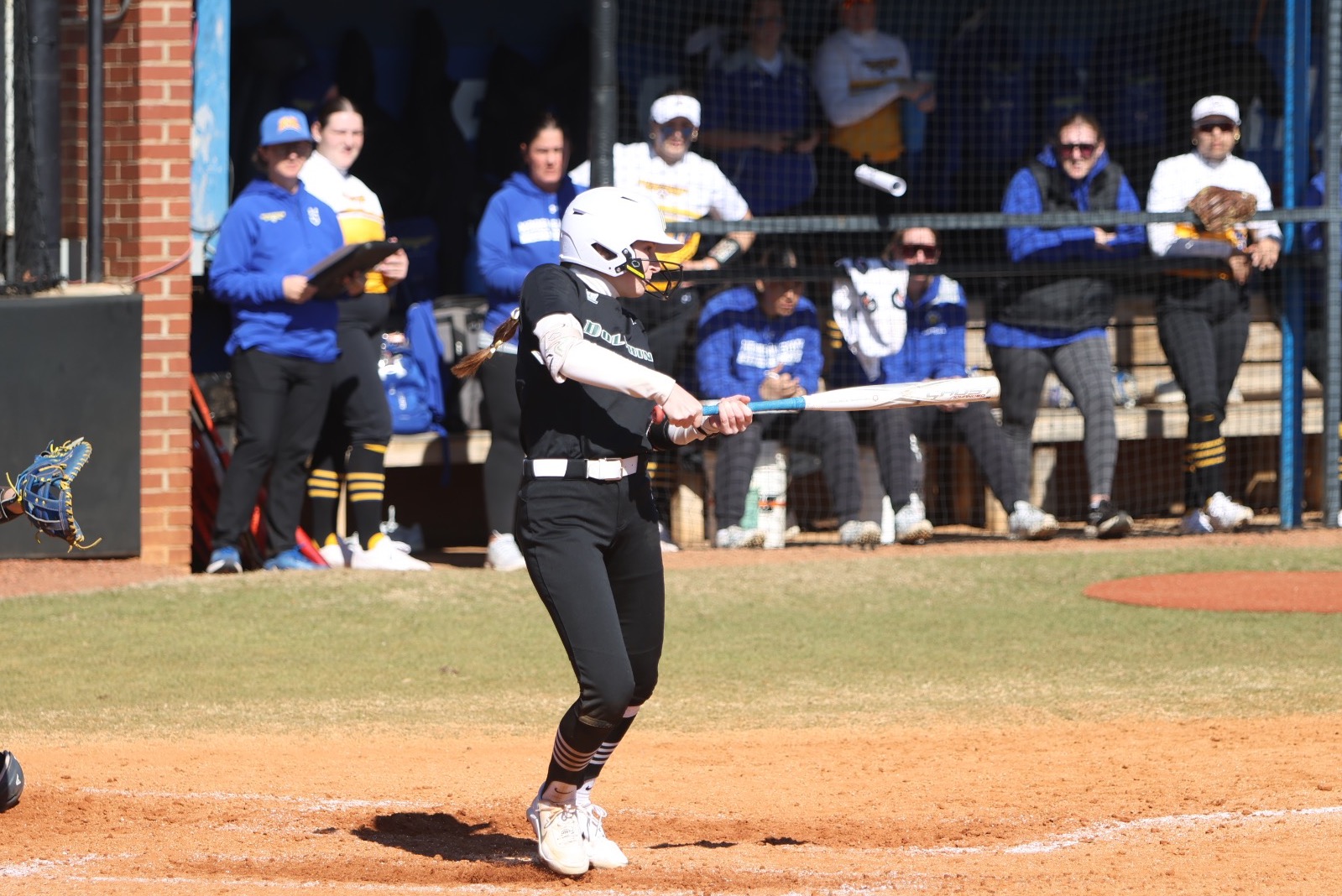 Avery Linn swinging vs Morehead State