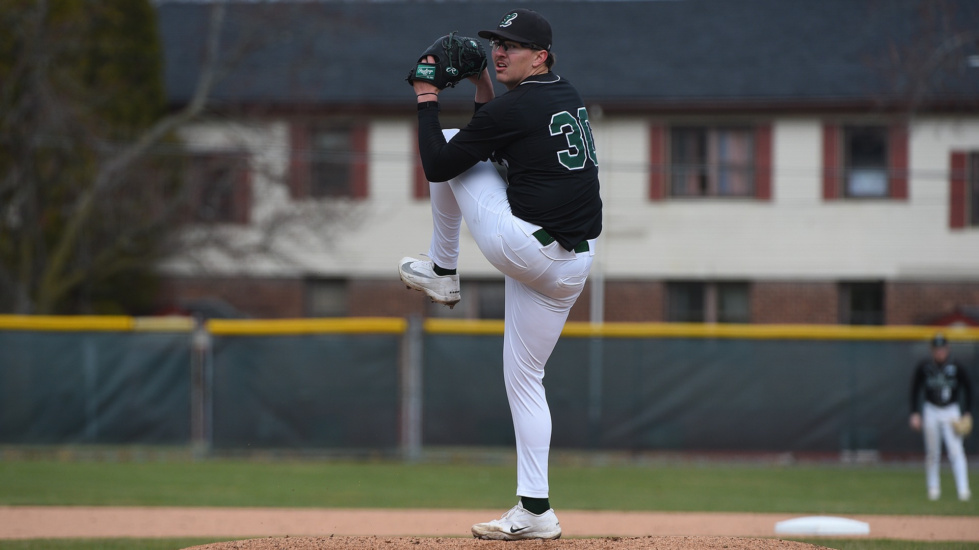 Luke VanMarter winds up to deliver a pitch against Coppin State