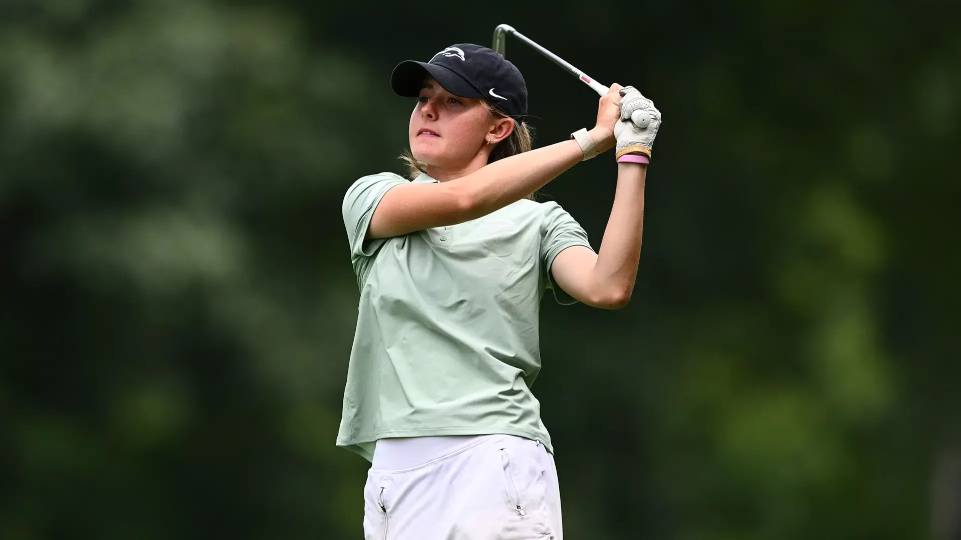 Caroline McShea follows through on a swing at the Roseann Schwartz Invitational