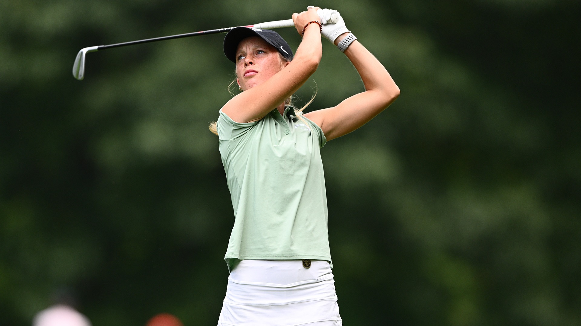 Destiny Jodoin follows through on a tee shot at Youngstown State