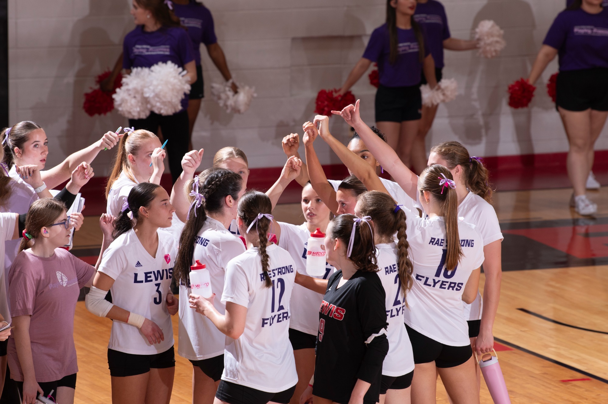 Women's Volleyball huddle vs Drury