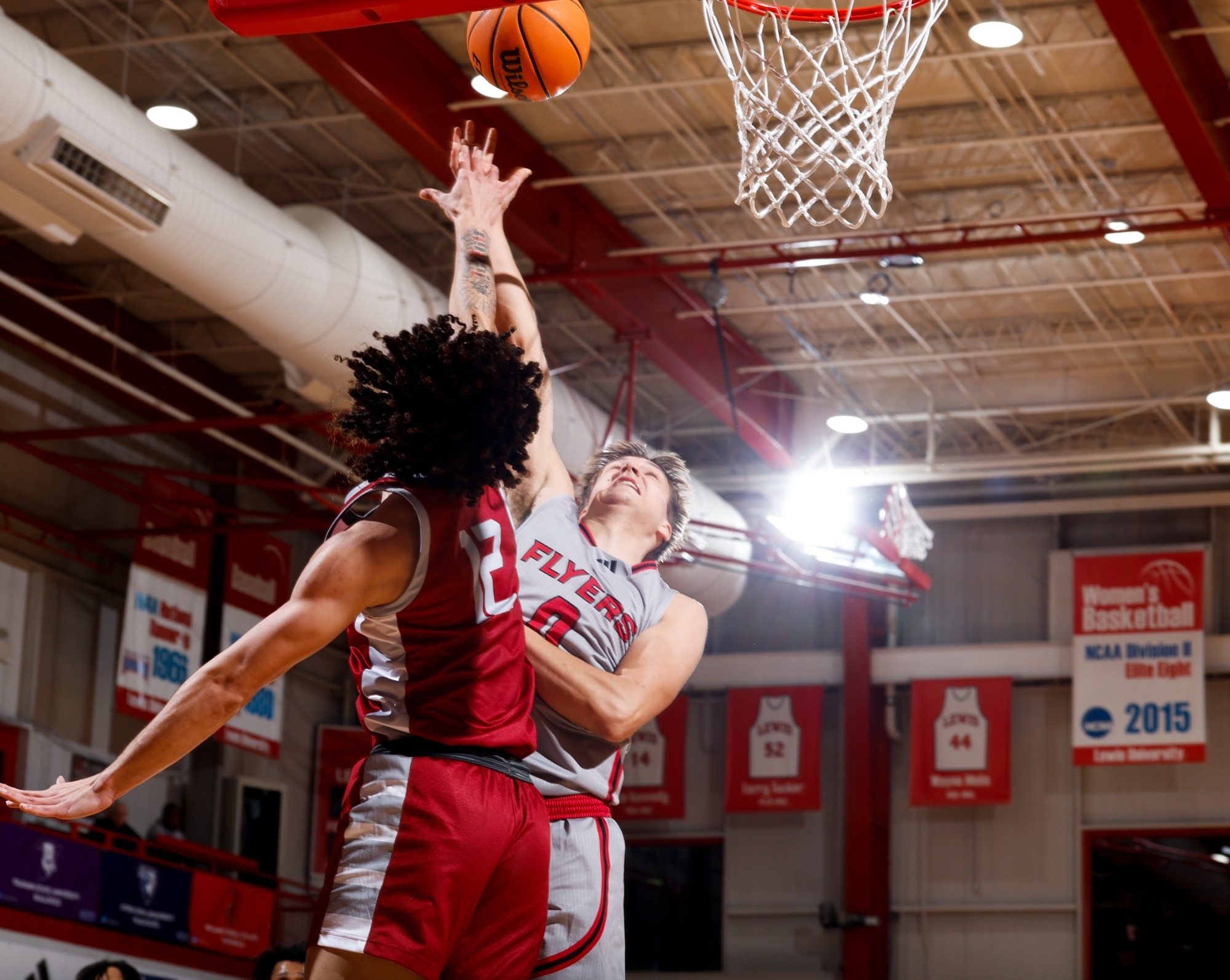 Arius Alijosius goes for a layup