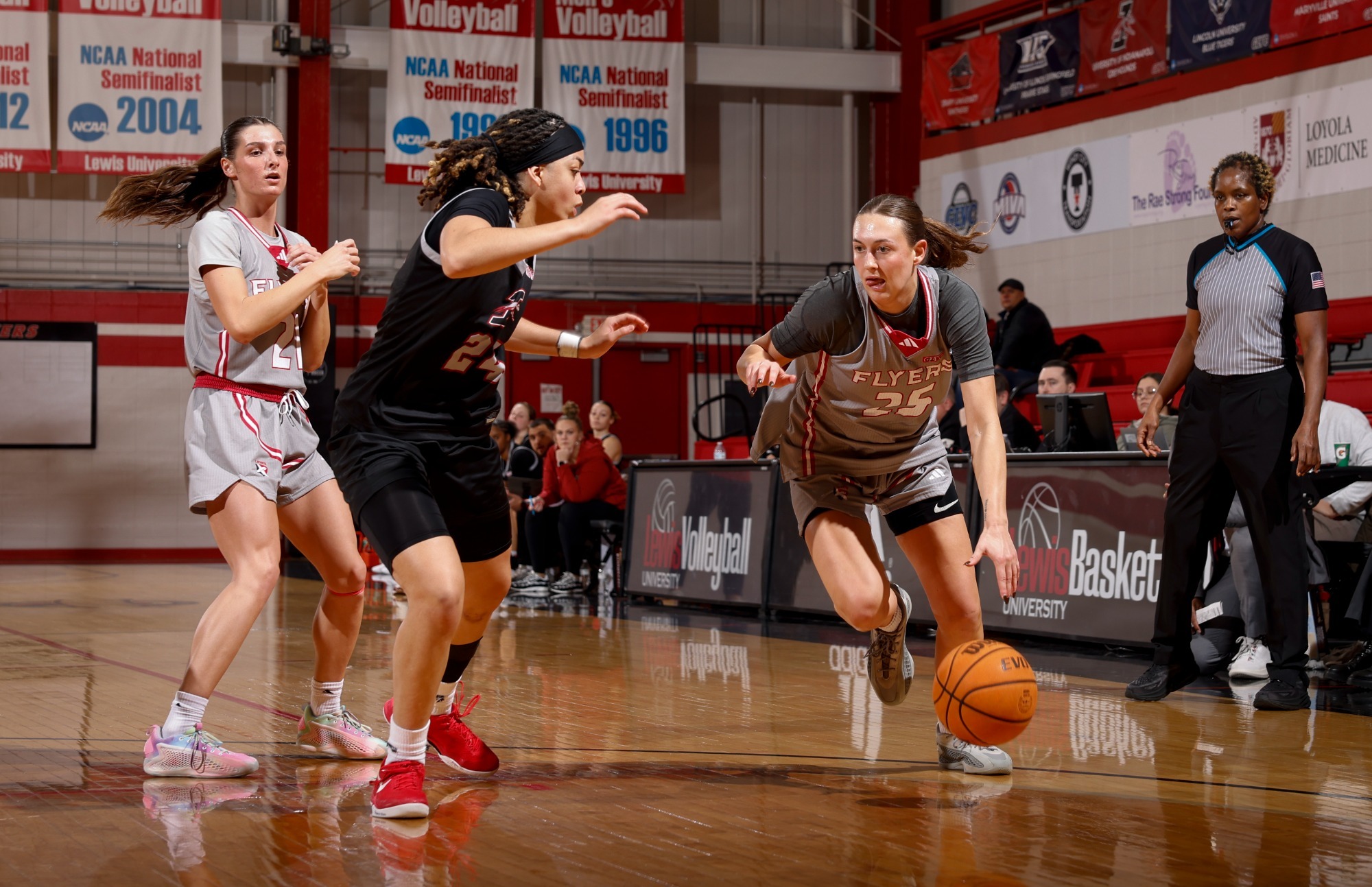 Mallory Ramage dribbles past her defender