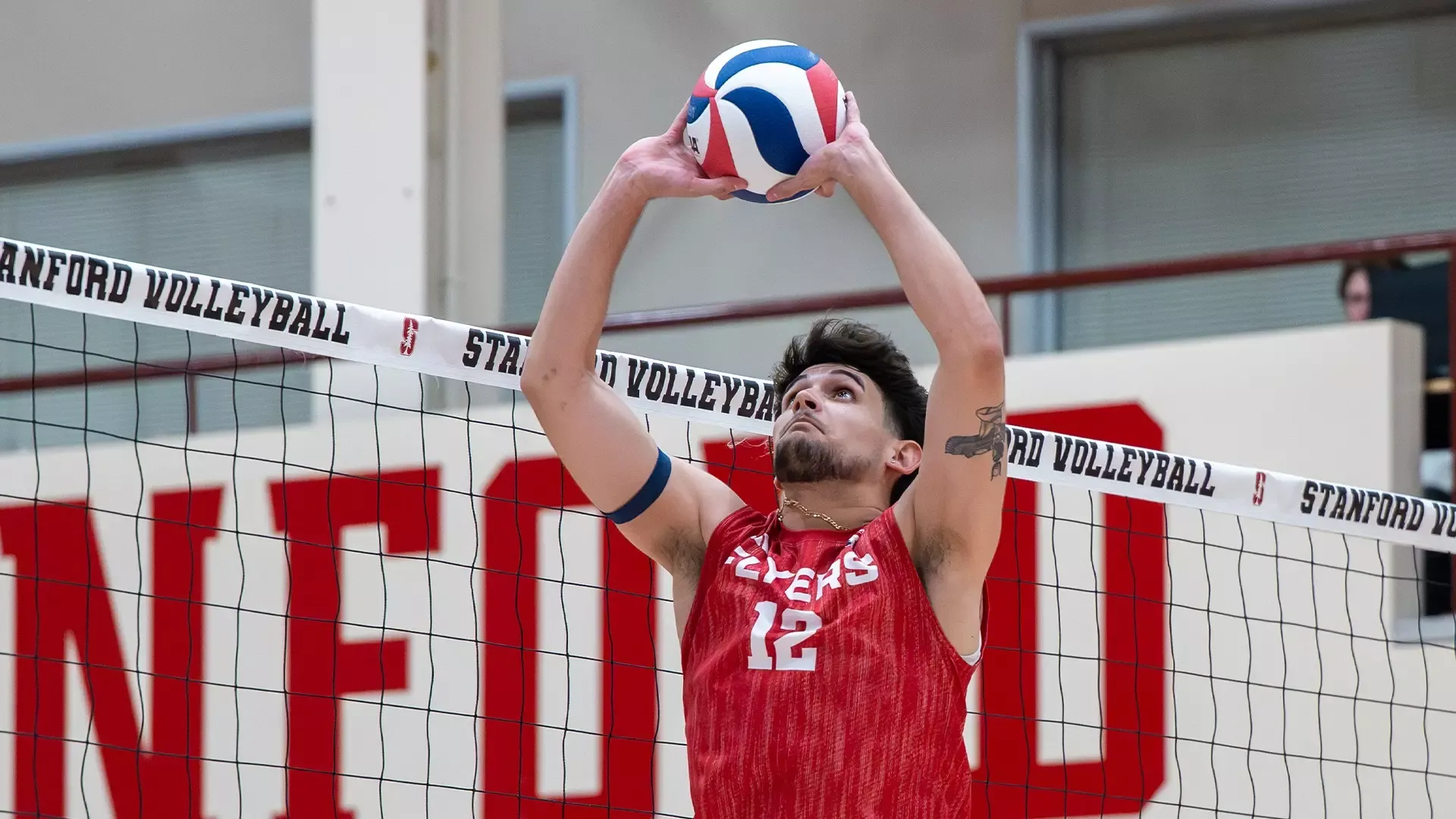 Estrada Sets the ball against Stanford