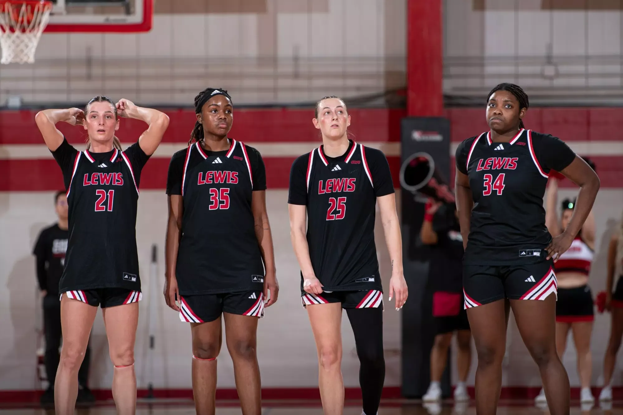 Lewis Players look at the scoreboard