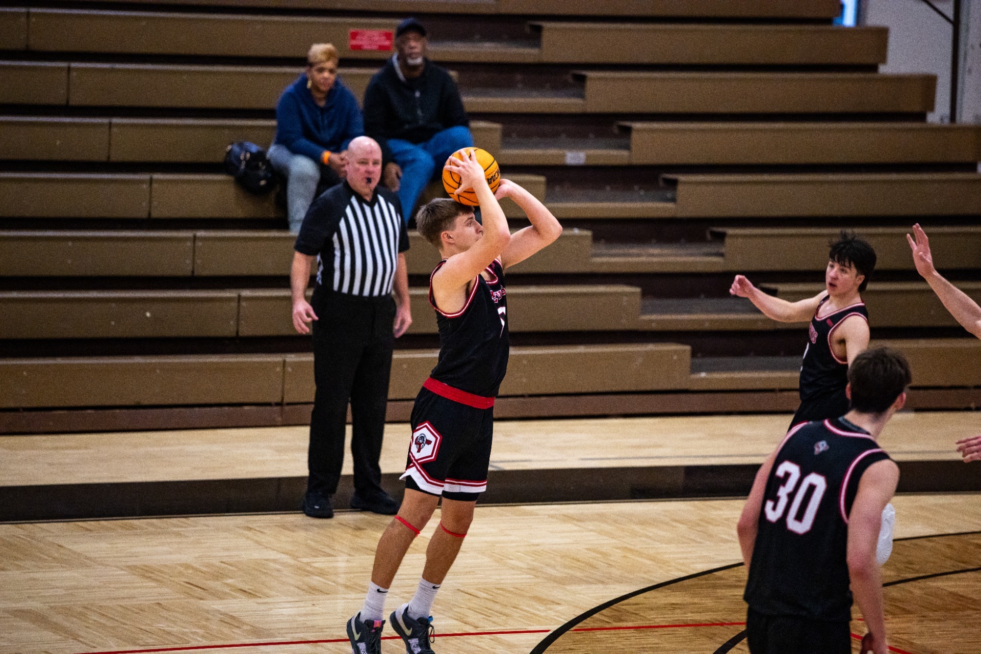 Arius Alijosius shoots a 3-pointer