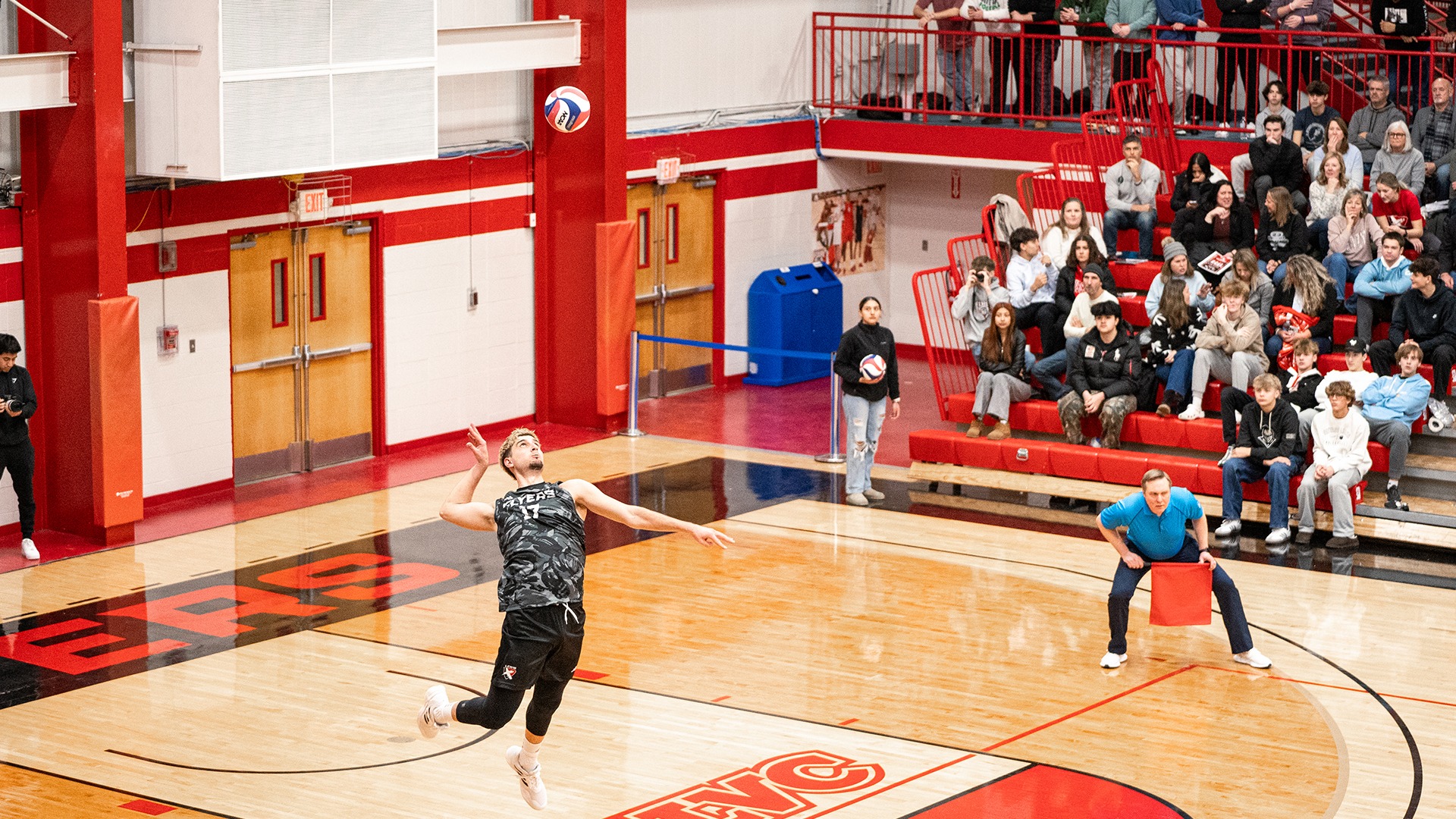 Oguzhan Oguz serves against Long Beach state