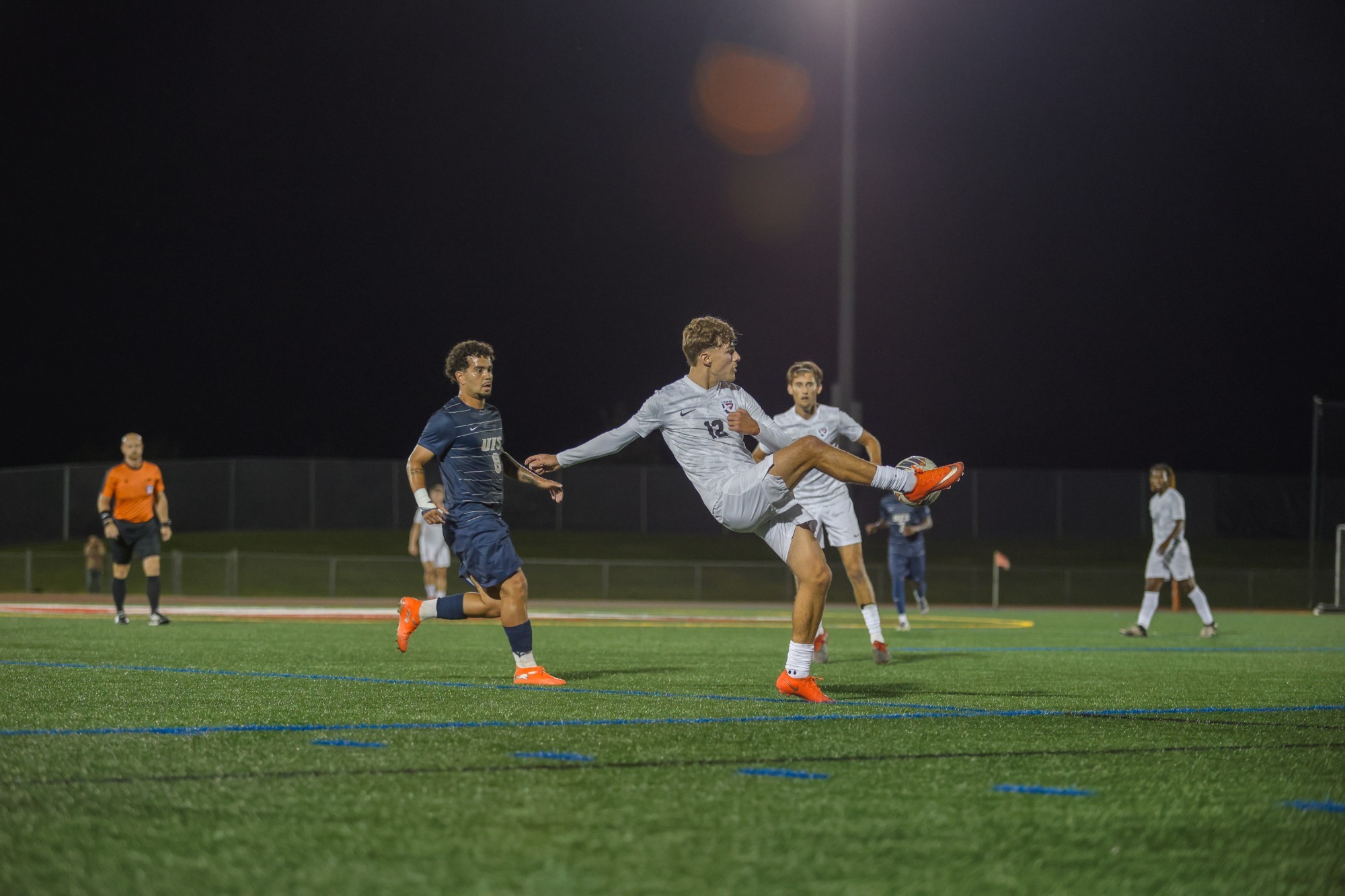 Kuba Slupski clears the ball