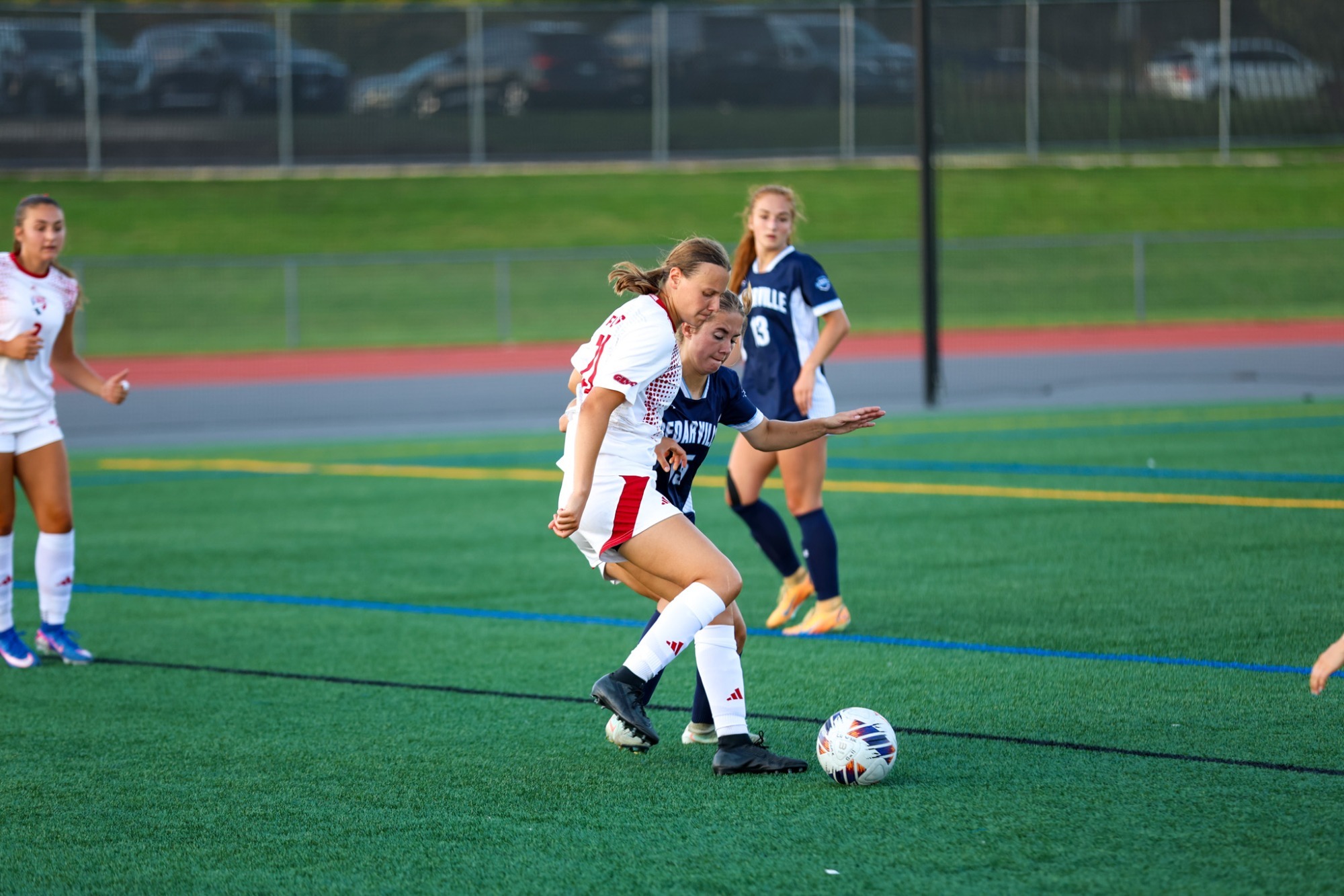 Anna Linsler moves past a defender