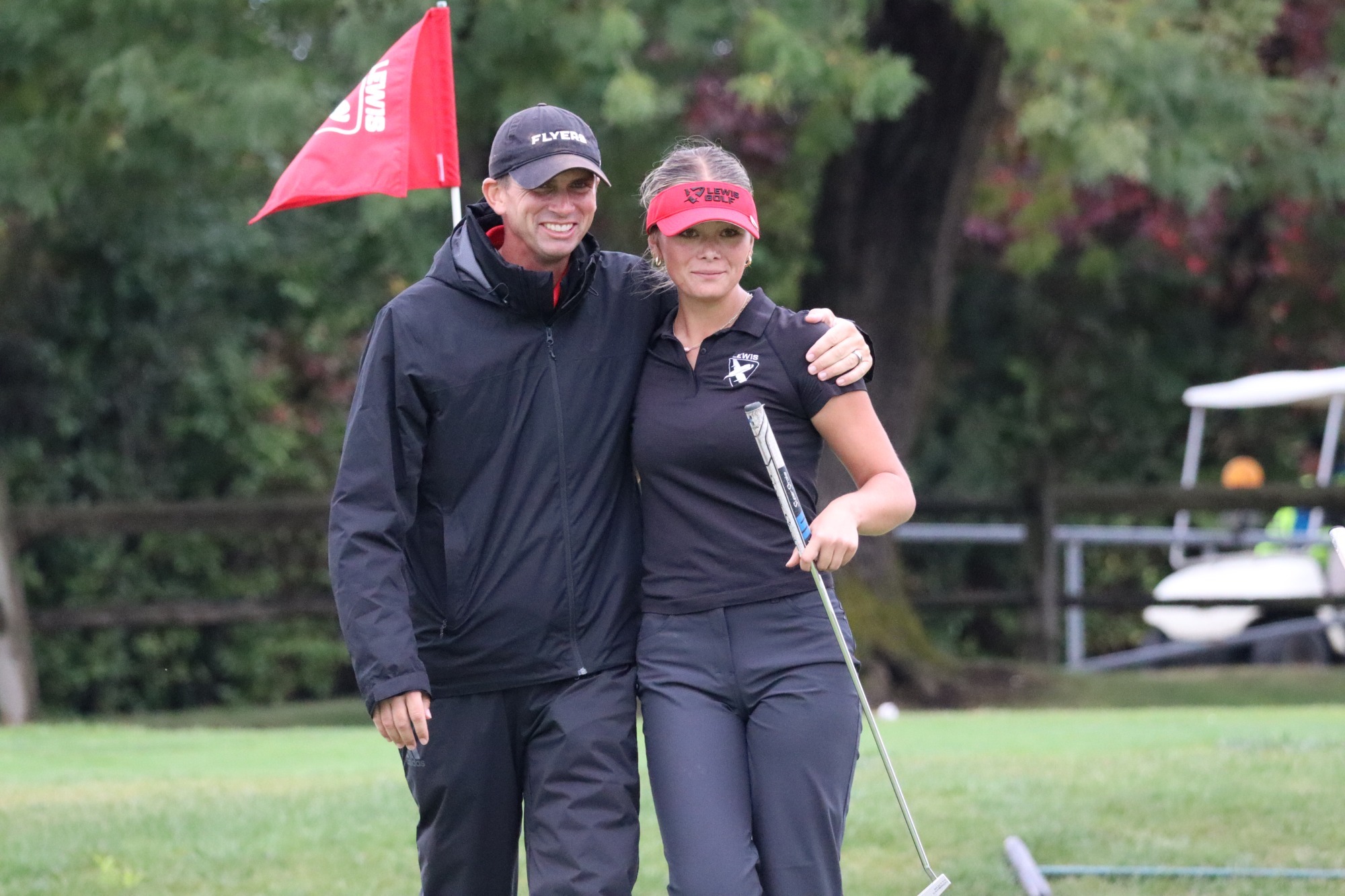 Greg Barasel and Sofia Lawler celebrate her tournament win