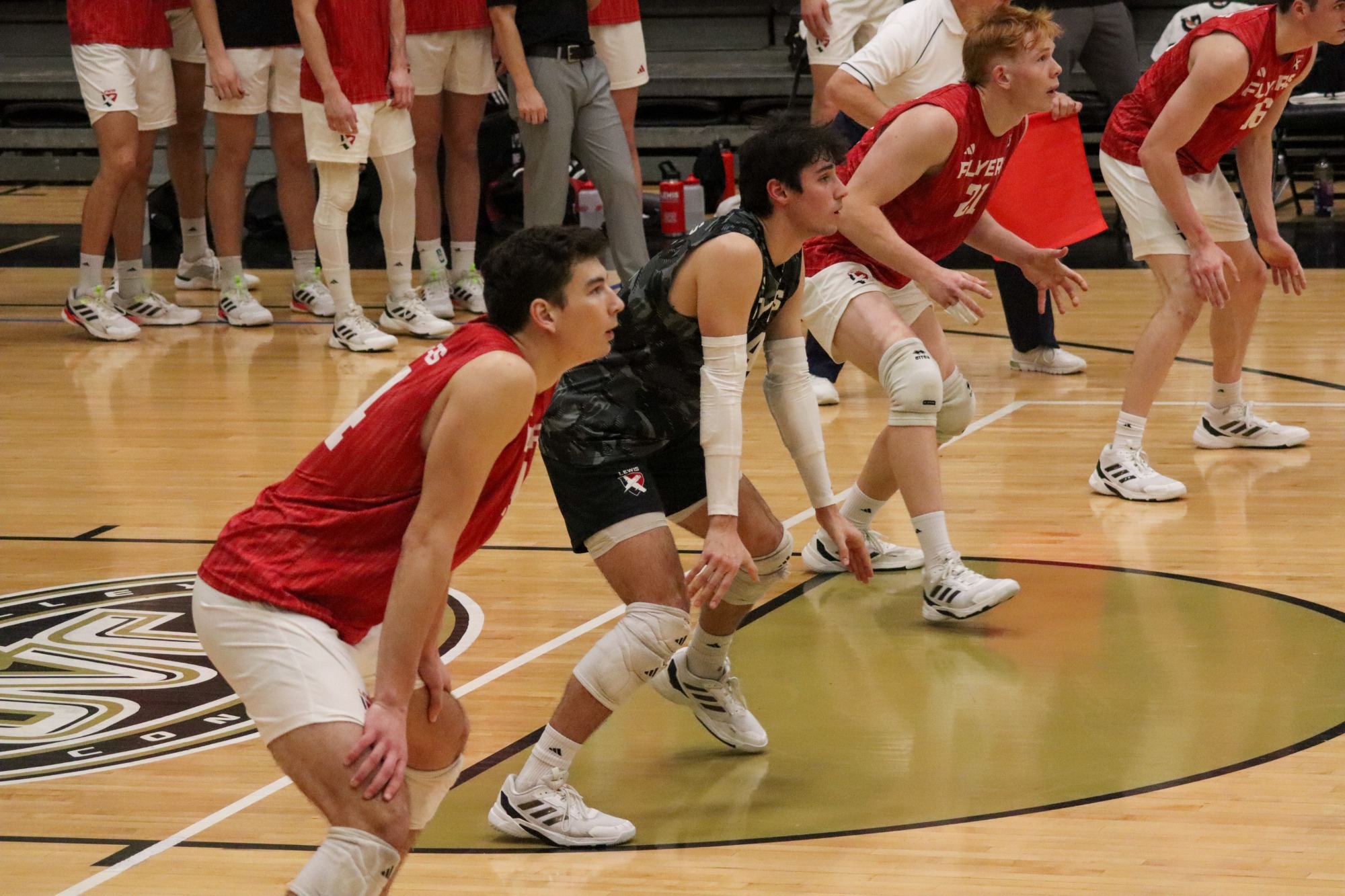 Nico Paula and Daniel Haber wait for a serve