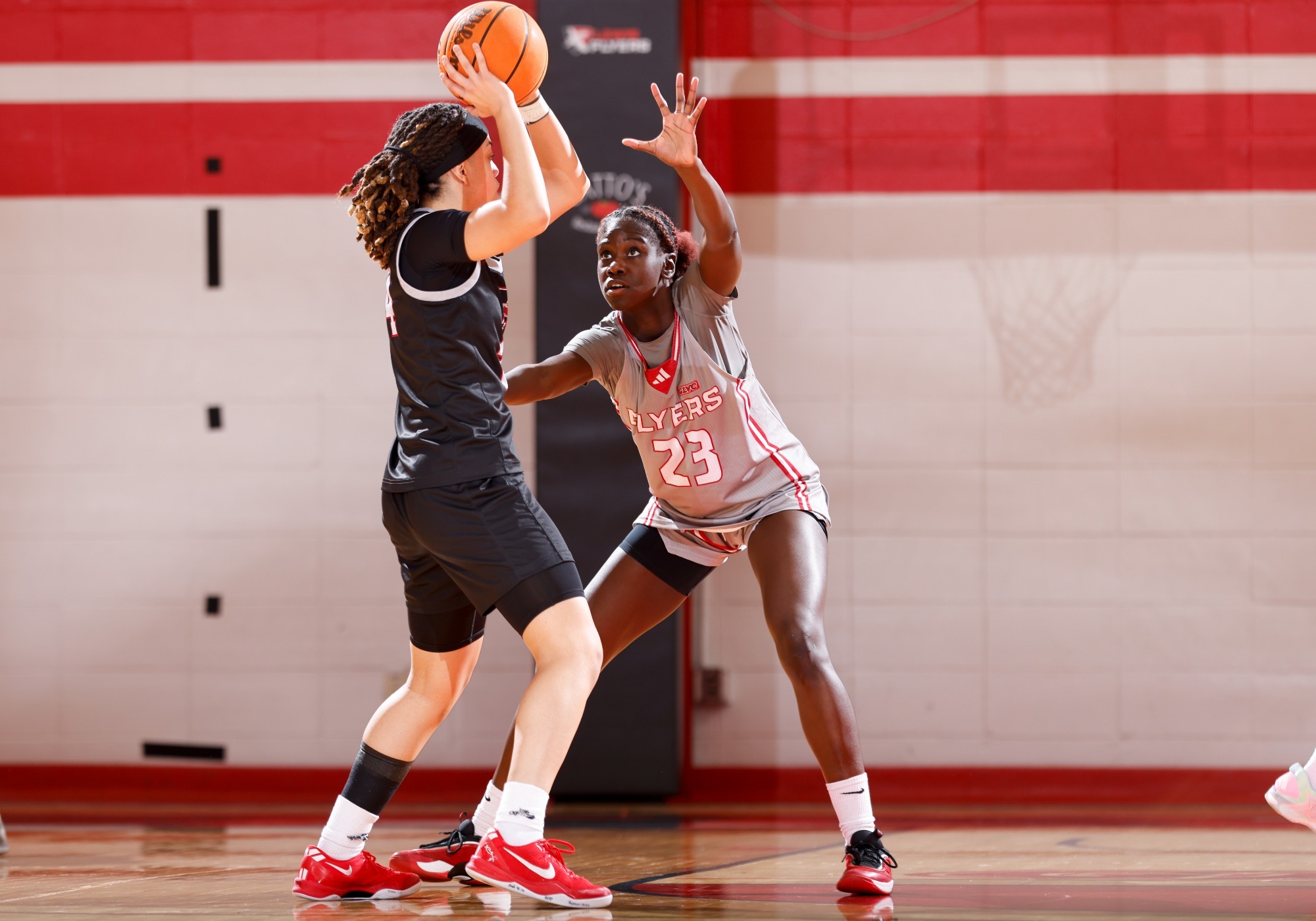 Mercy Lasu guards a defender