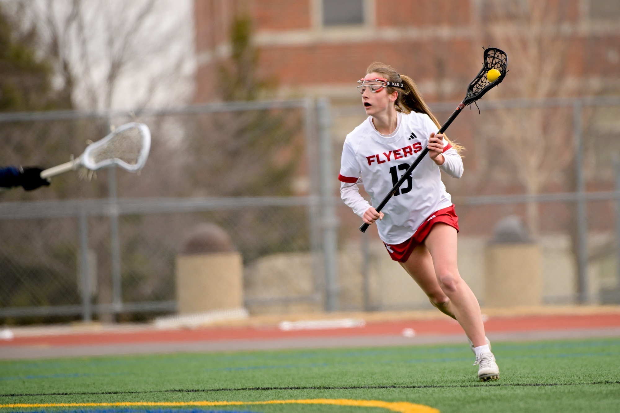 Amelia Procyk runs with the ball