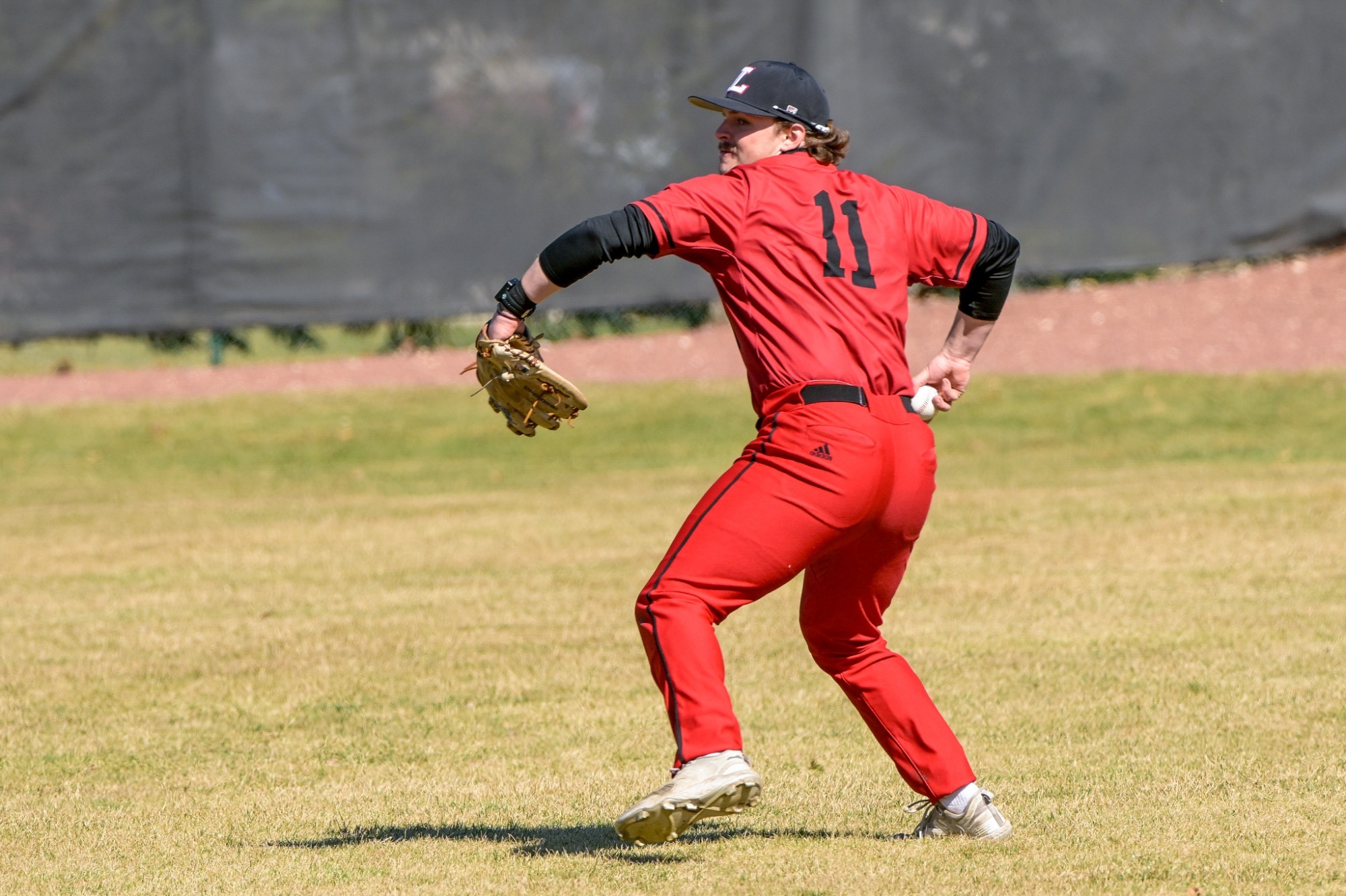 Chris Daugherty throws to the infield