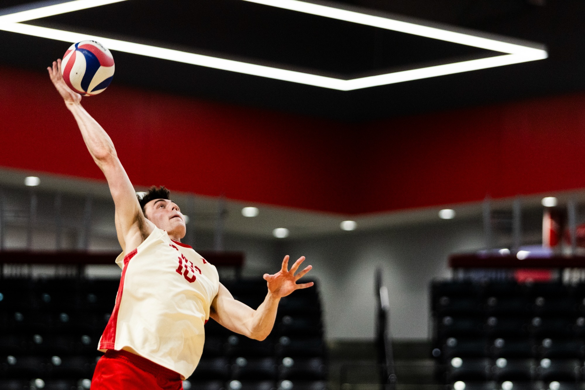 Cole Sweitzer serves