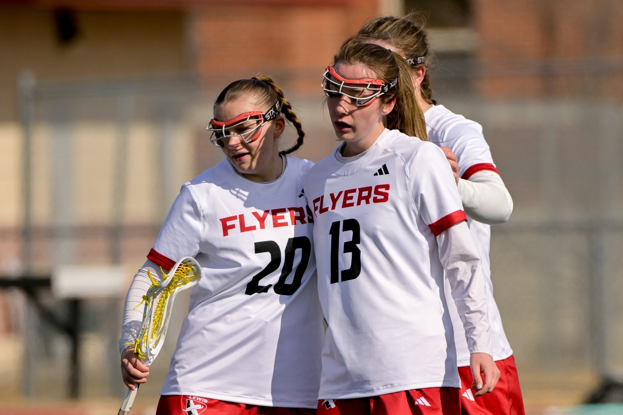 Clark and Procyk celebrate a goal