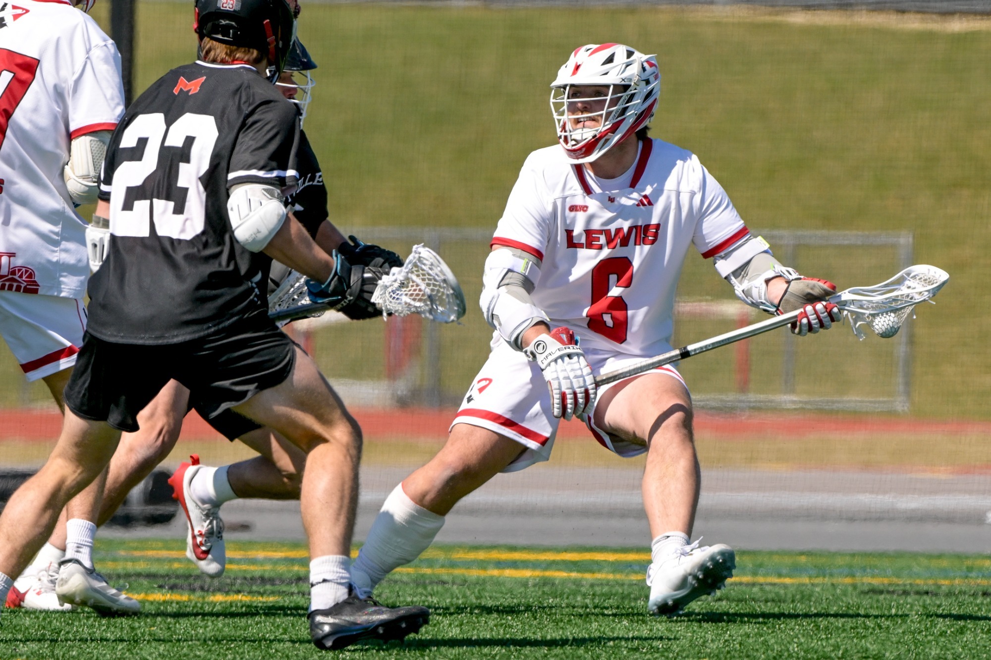 Camden Rappis tries to get by a Maryville defender