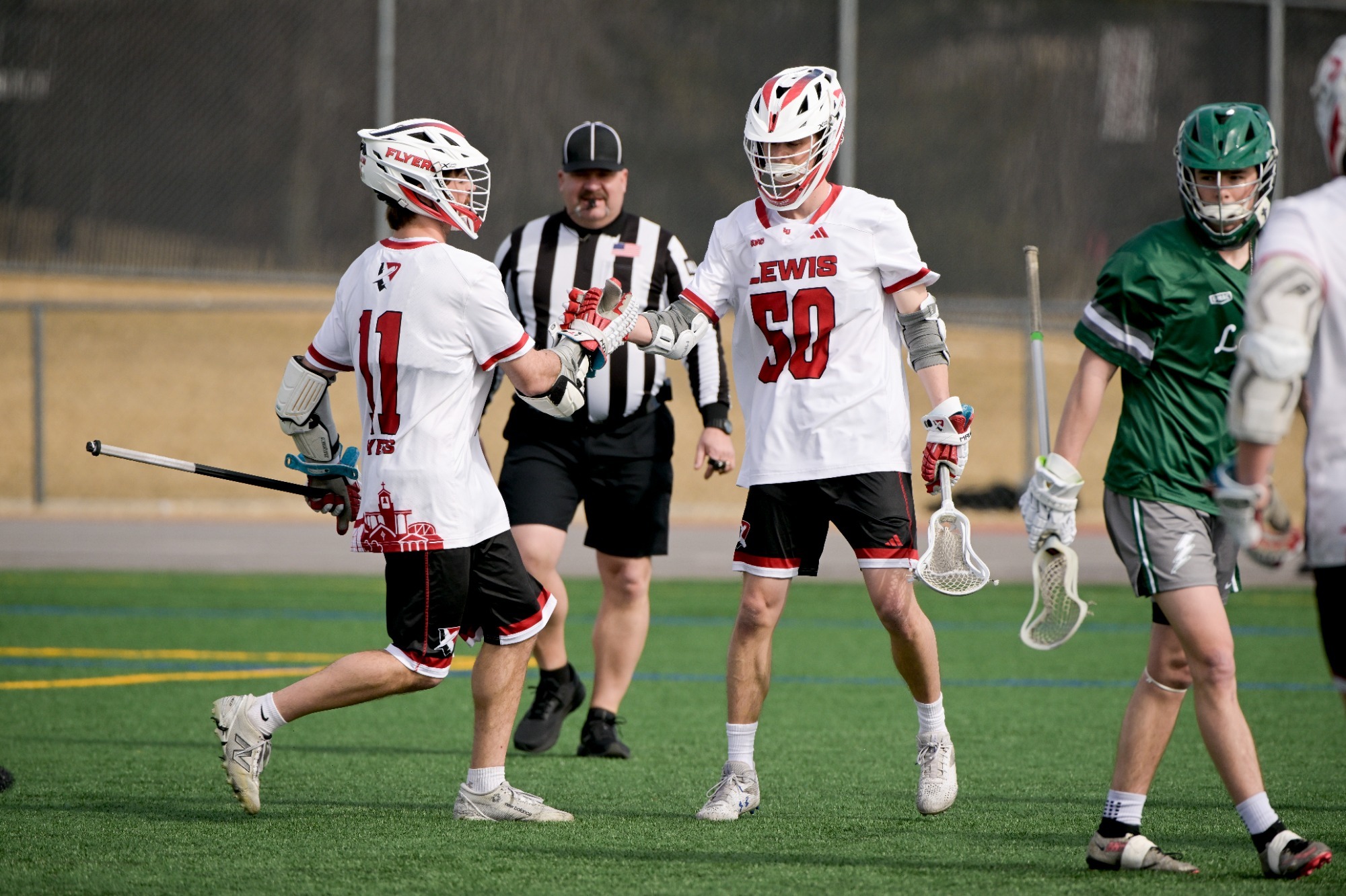 Kohl Wesner and Josh Schelfe celebrate a goal