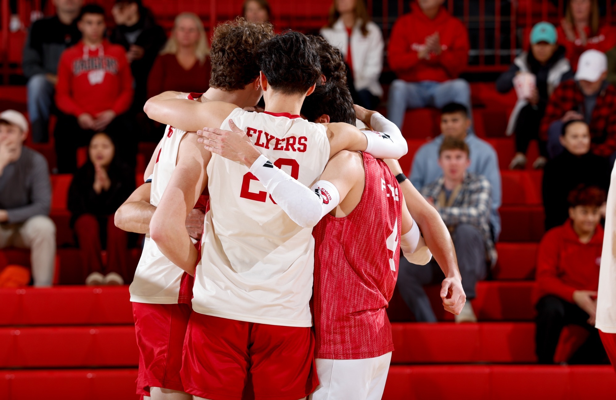 Lewis Men’s Volleyball huddle vs. Roosevelt