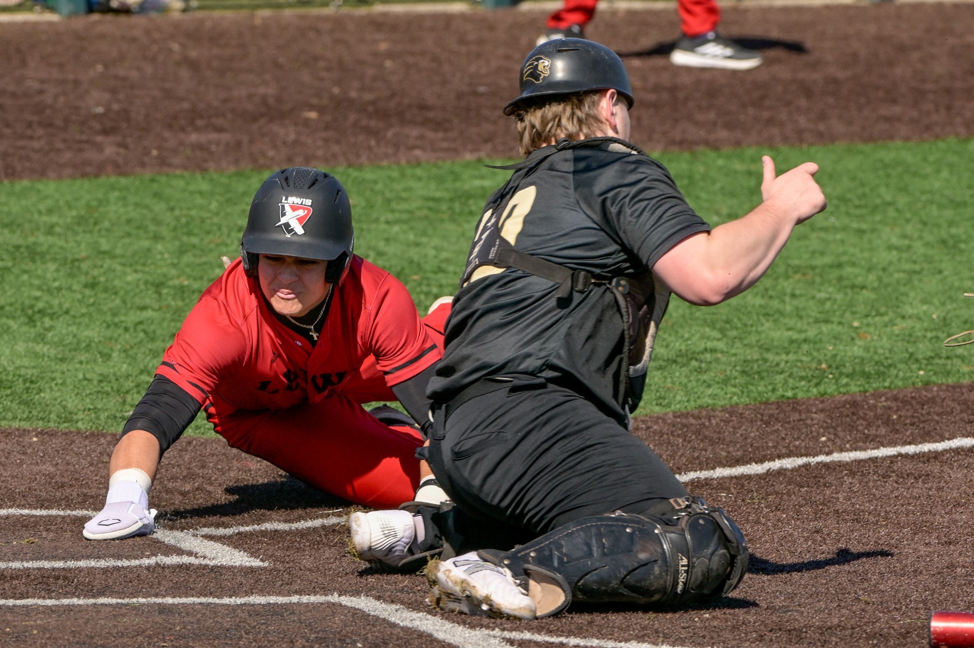 Constantine Coines slides home