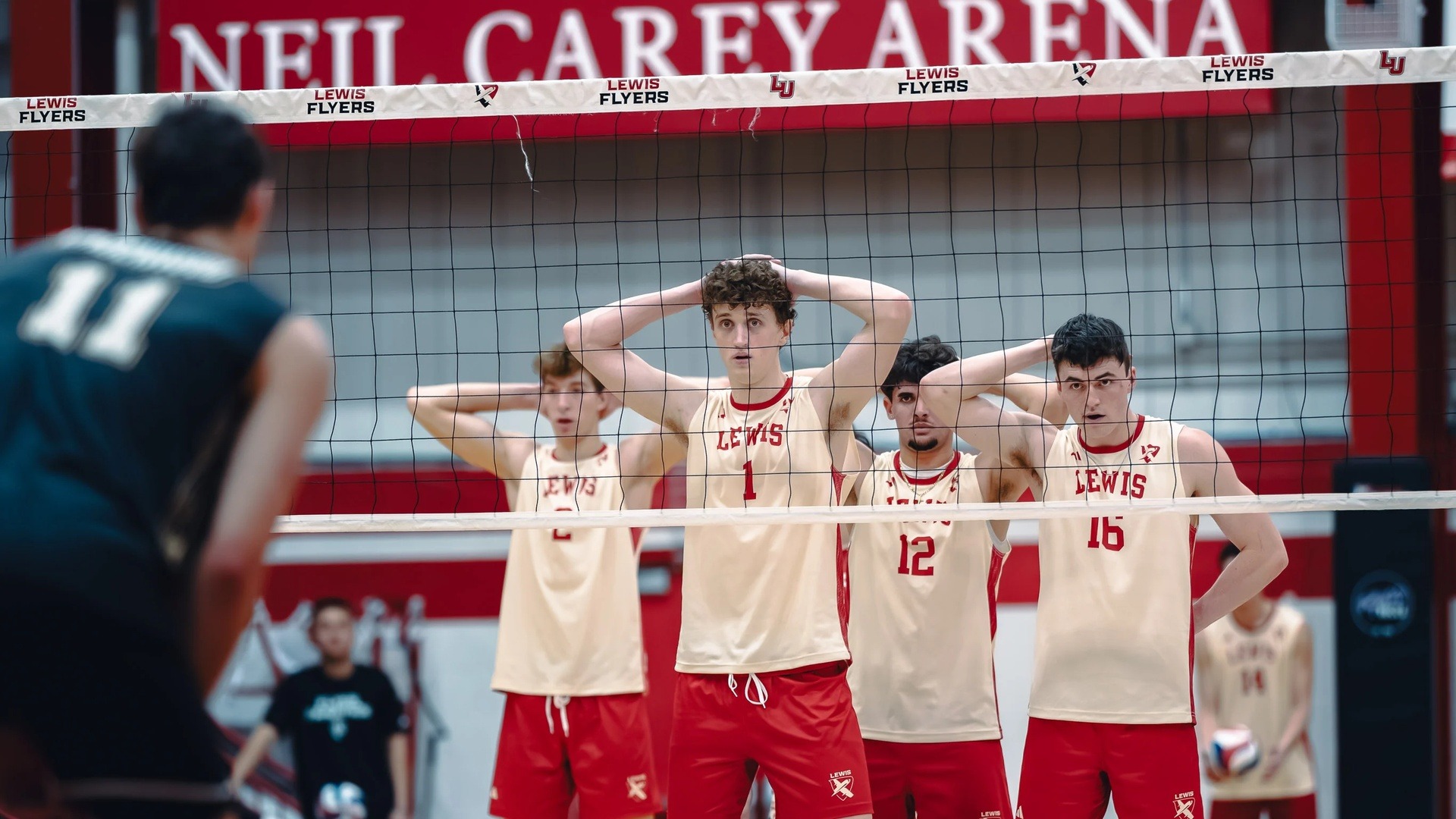Fred Kreuger Beer and Cole Sweitzer wait for a serve