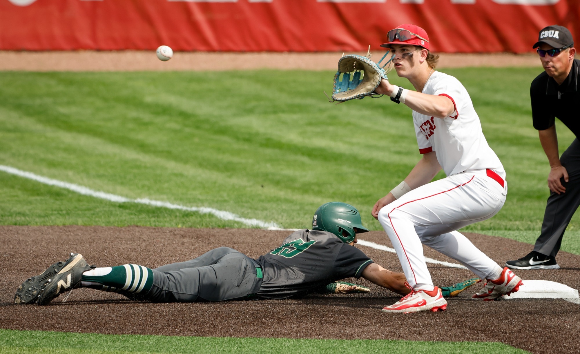 Jimmy Spellman guards first base