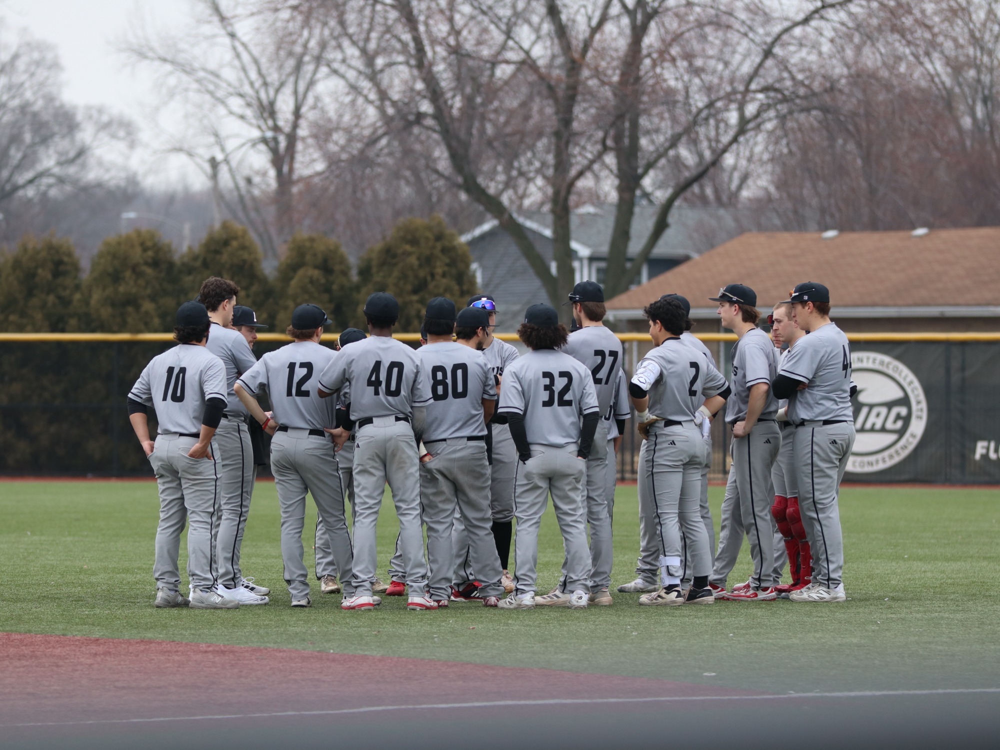 The Lewis baseball team gathers before a game