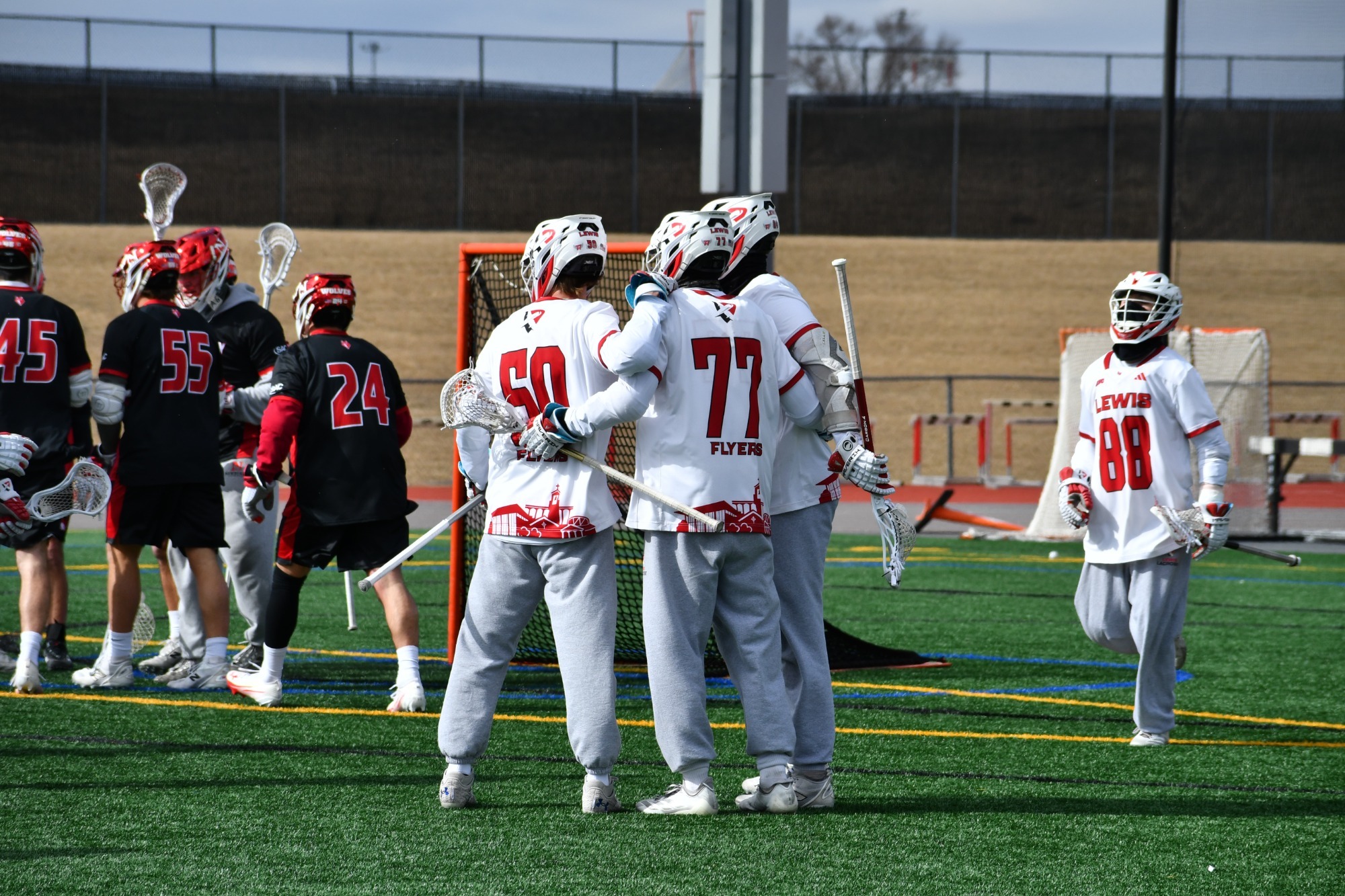 Josh Schelfe and Lance McCann celebrate a goal