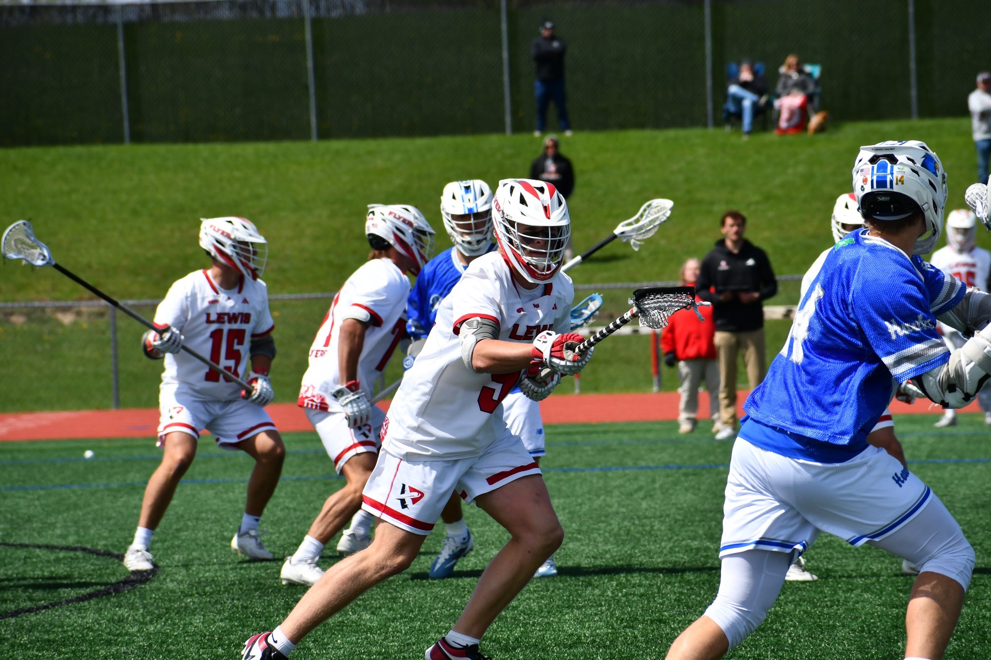 Braylon Ray guards a Rockhurst defender