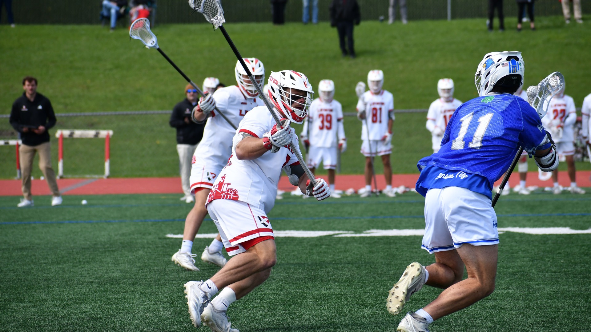 Logan Suchy guards a defender