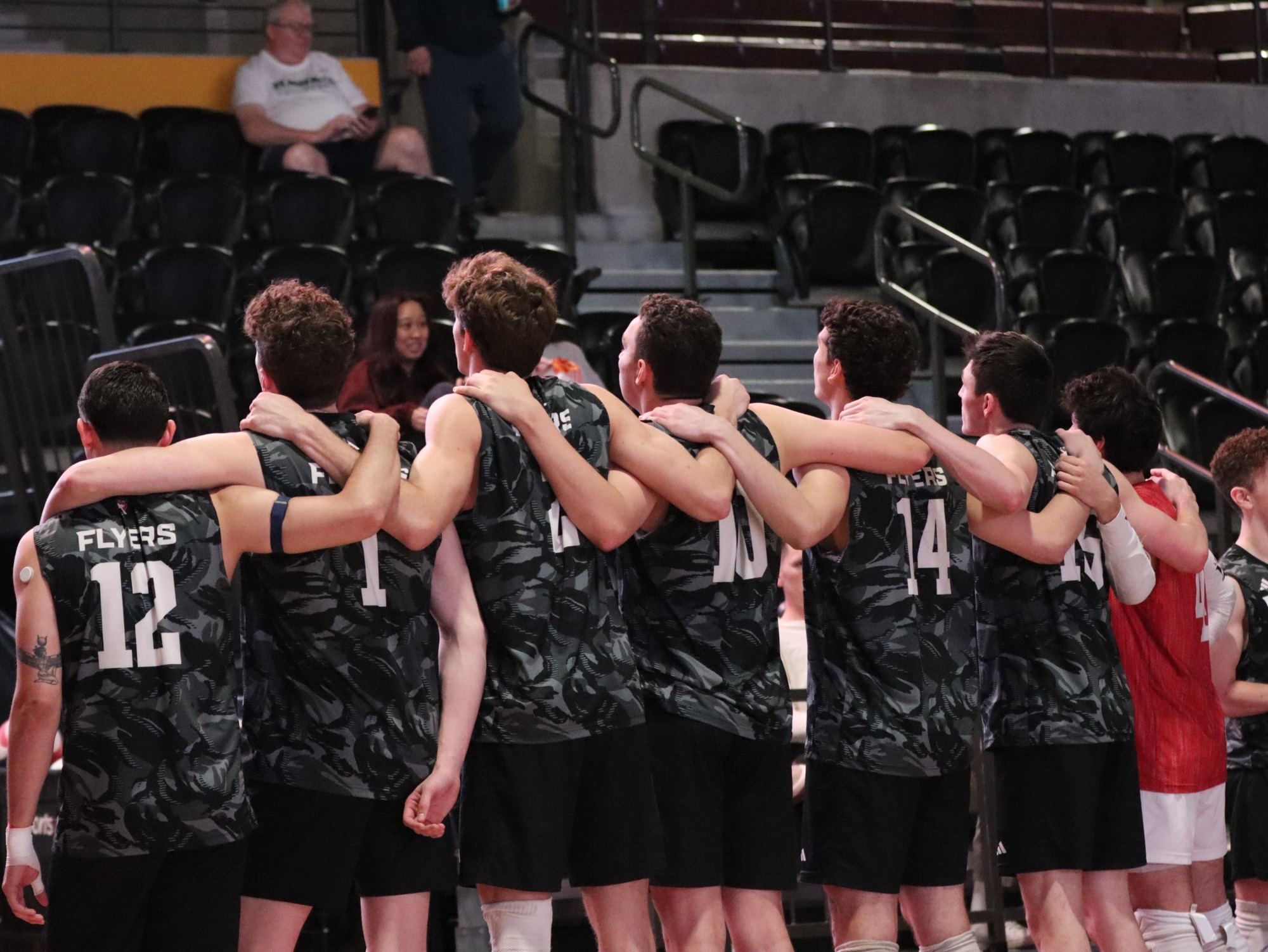 Men's volleyball players pregame at Loyola