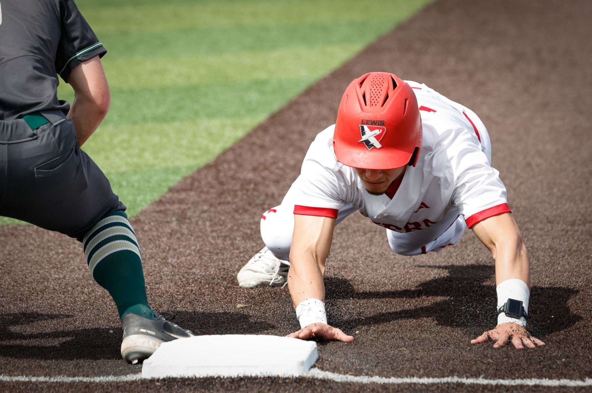 Lewis Diving Back to First Base