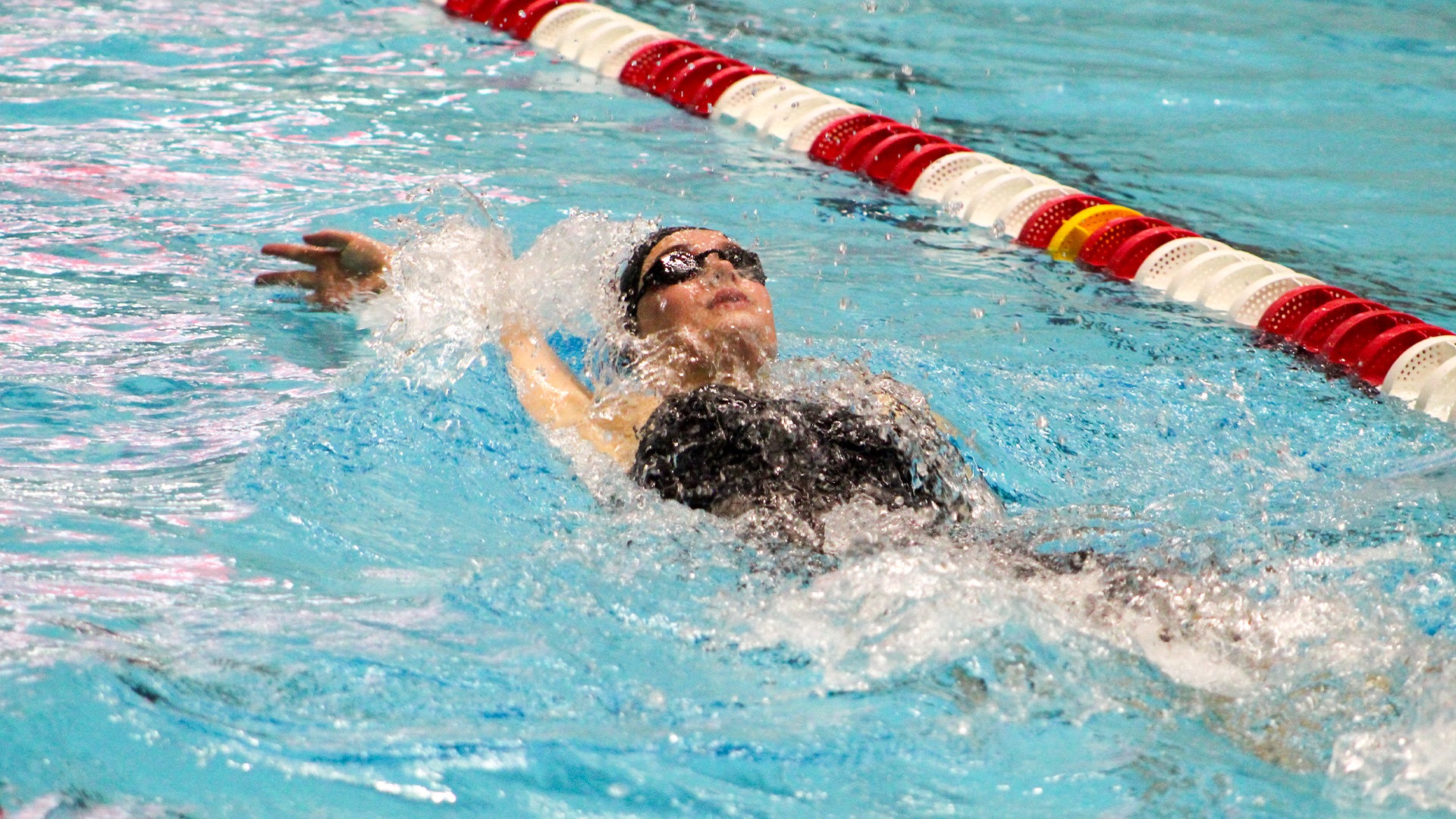 Amelia Marsicek swims in the 200 back