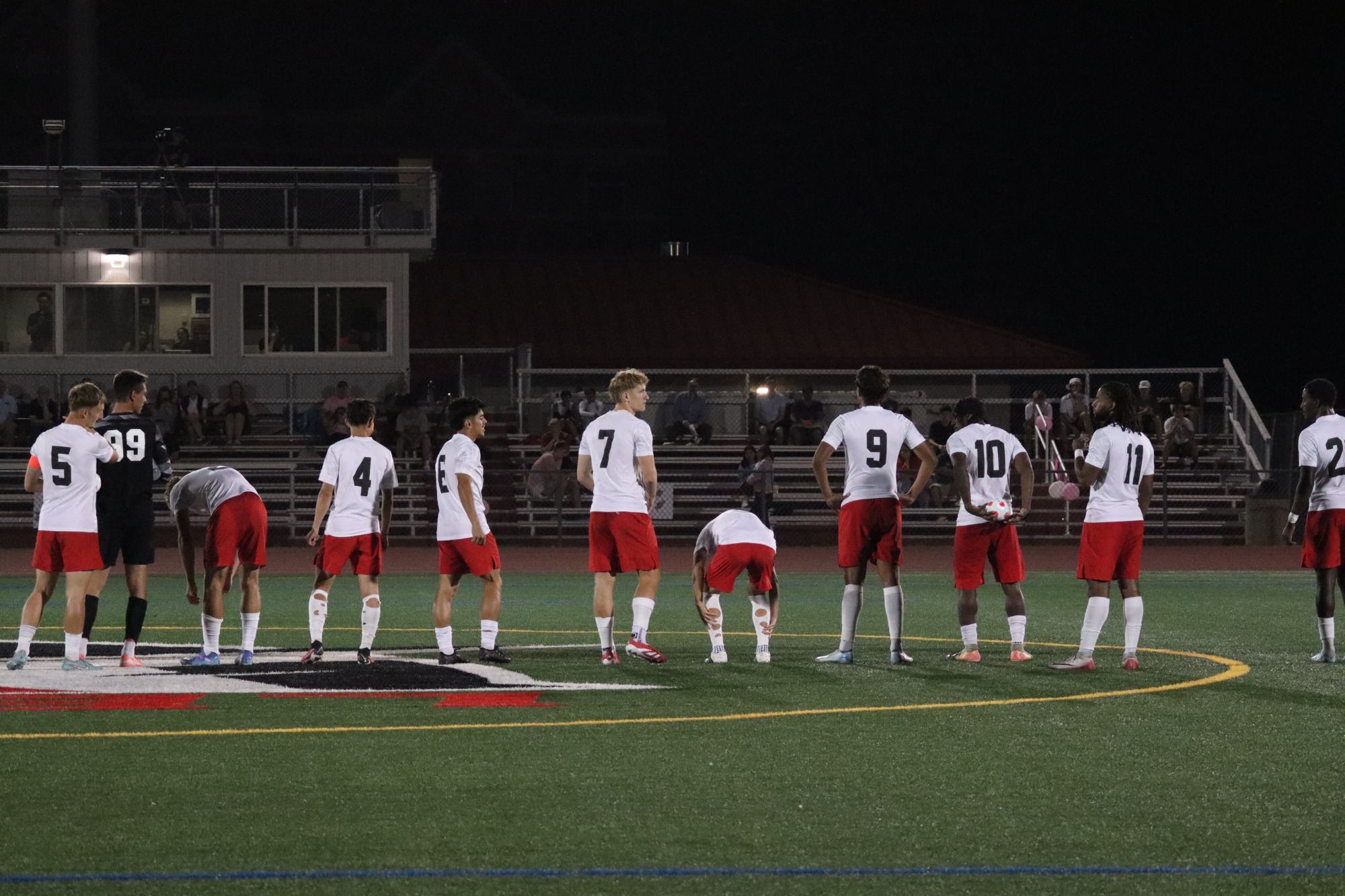 Men's soccer players line pregame