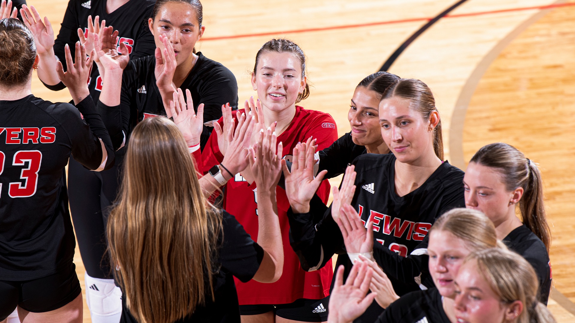 Women's volleyball pregame high-five