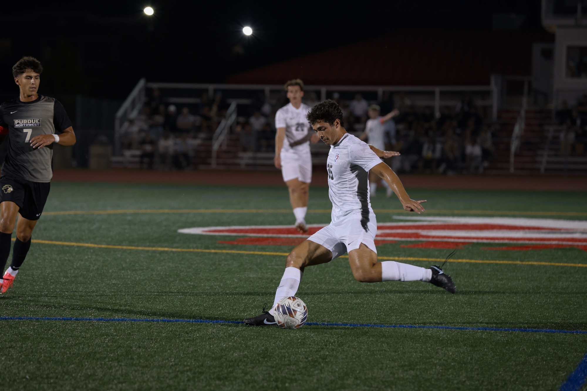 Georgio Kavalas Kicks a Ball