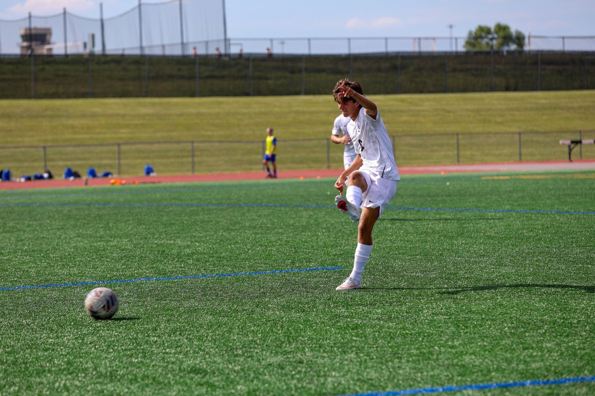 Johnny Nesci kicks ball