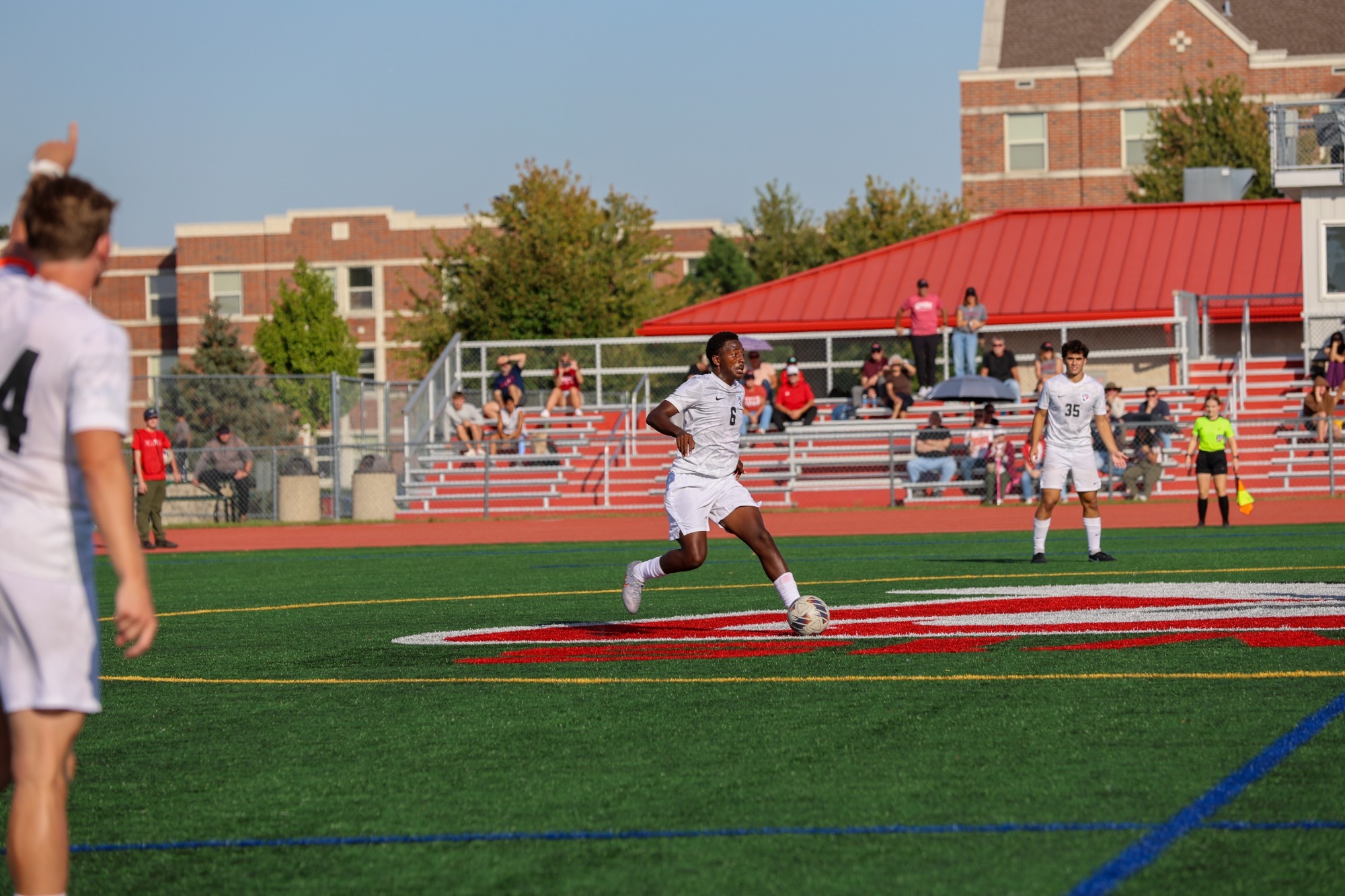 Pacifique Ndashimye runs up the field