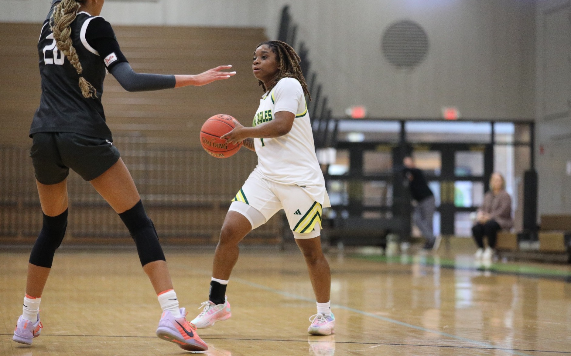 Myori Pruitt Dribbles Basketball