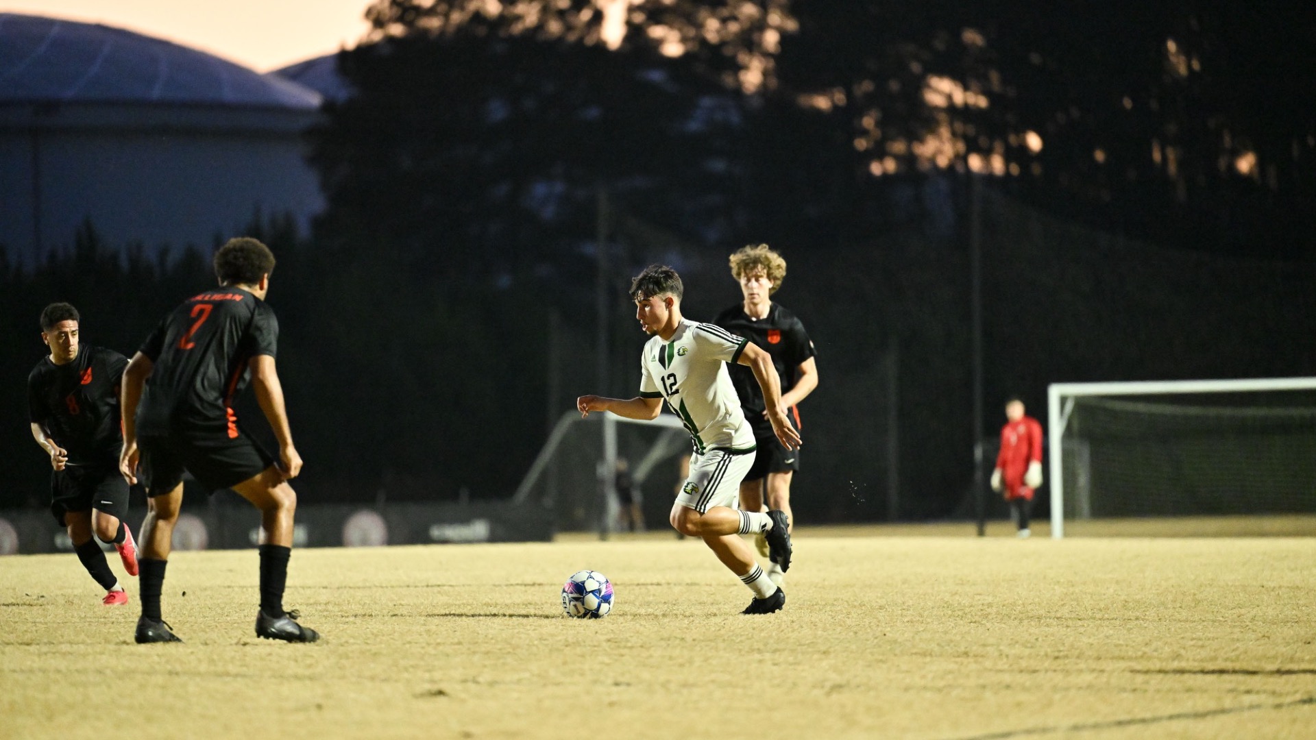 Alvaro Hidalgo dribbles the ball in the 2025 NAIA Round 2 Playoff