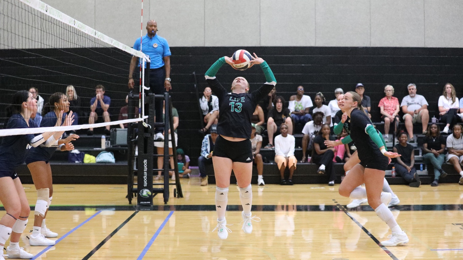 Emily Warner sets the ball