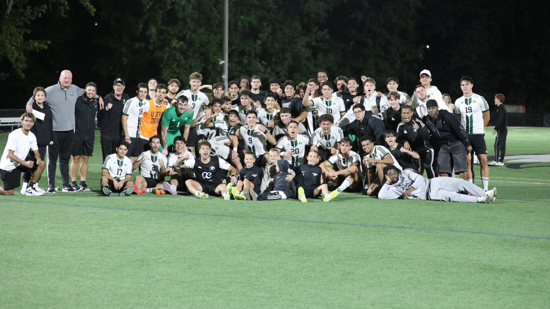 The 2026 Life University Men's Soccer Team celebrates Head Coach Alex Pama's 100th Career Win at Life