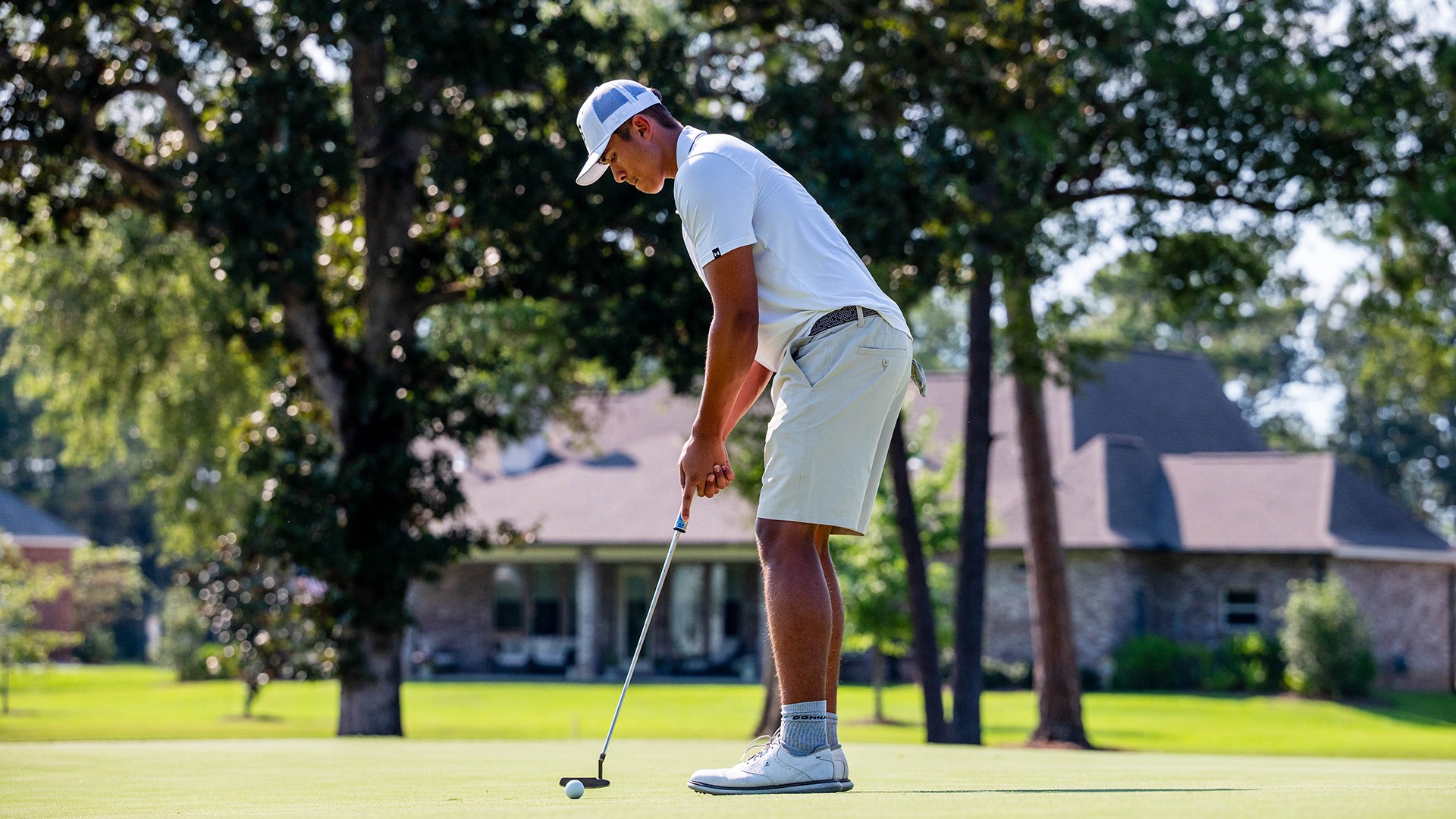 Gavin Ingram lines up a putt