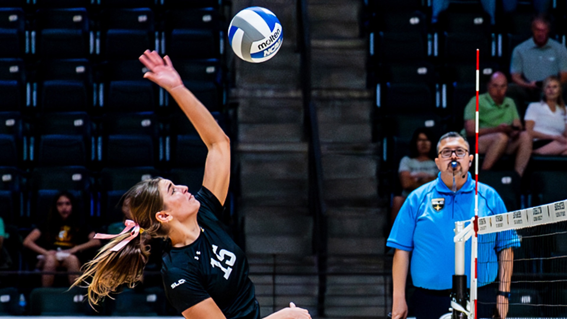 Alexis Logarbo leaps for an attack versus East Texas A&M on Oct. 11, 2025