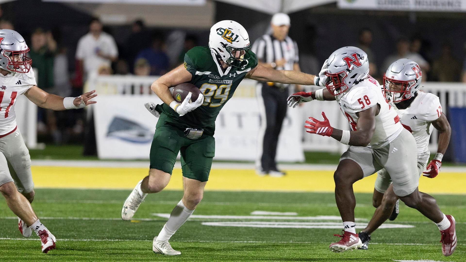 Cade Collier stiff arms a Nicholls defender Nov. 20, 2025